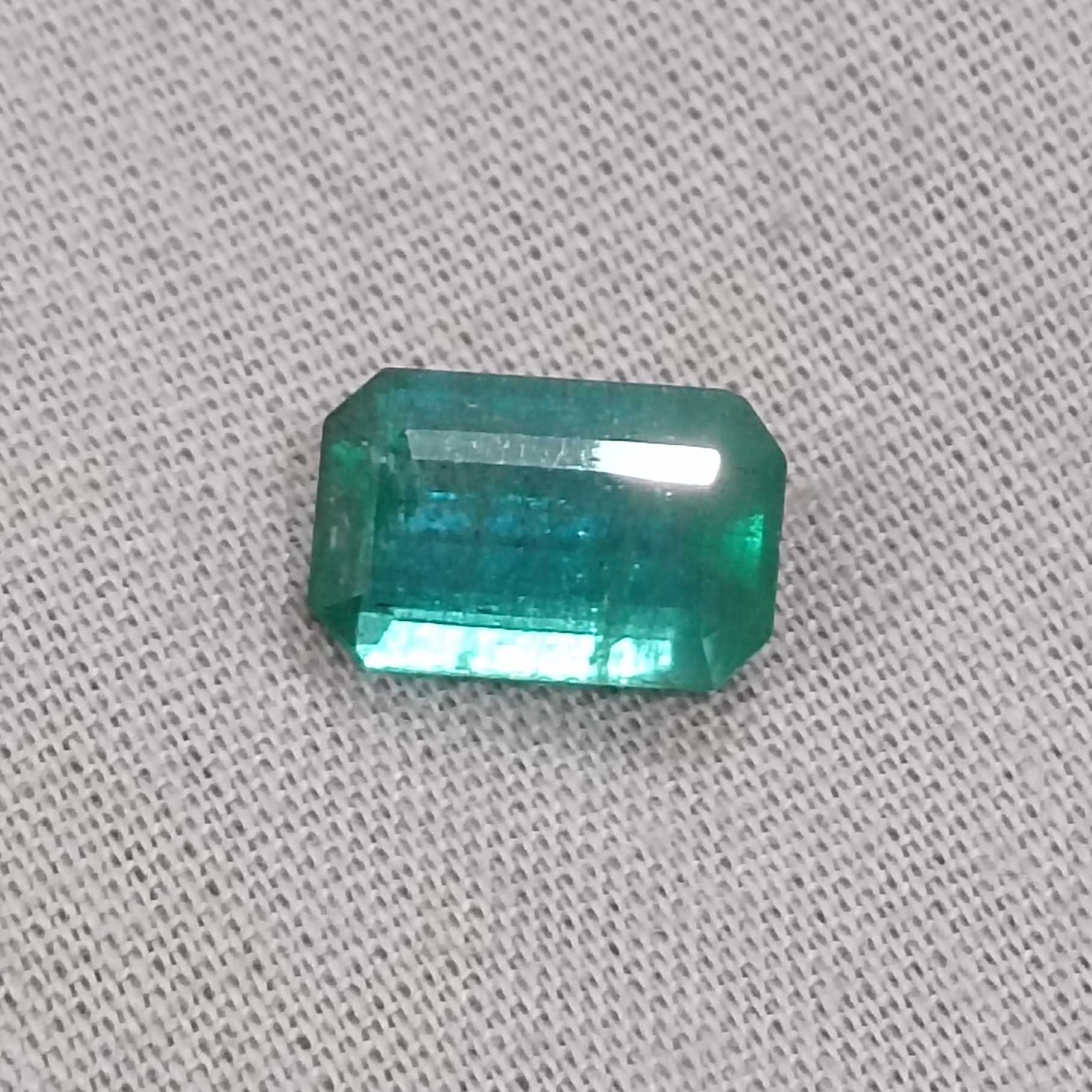 2.42ct deep medium green with blue tint octagon Zambian emerald/