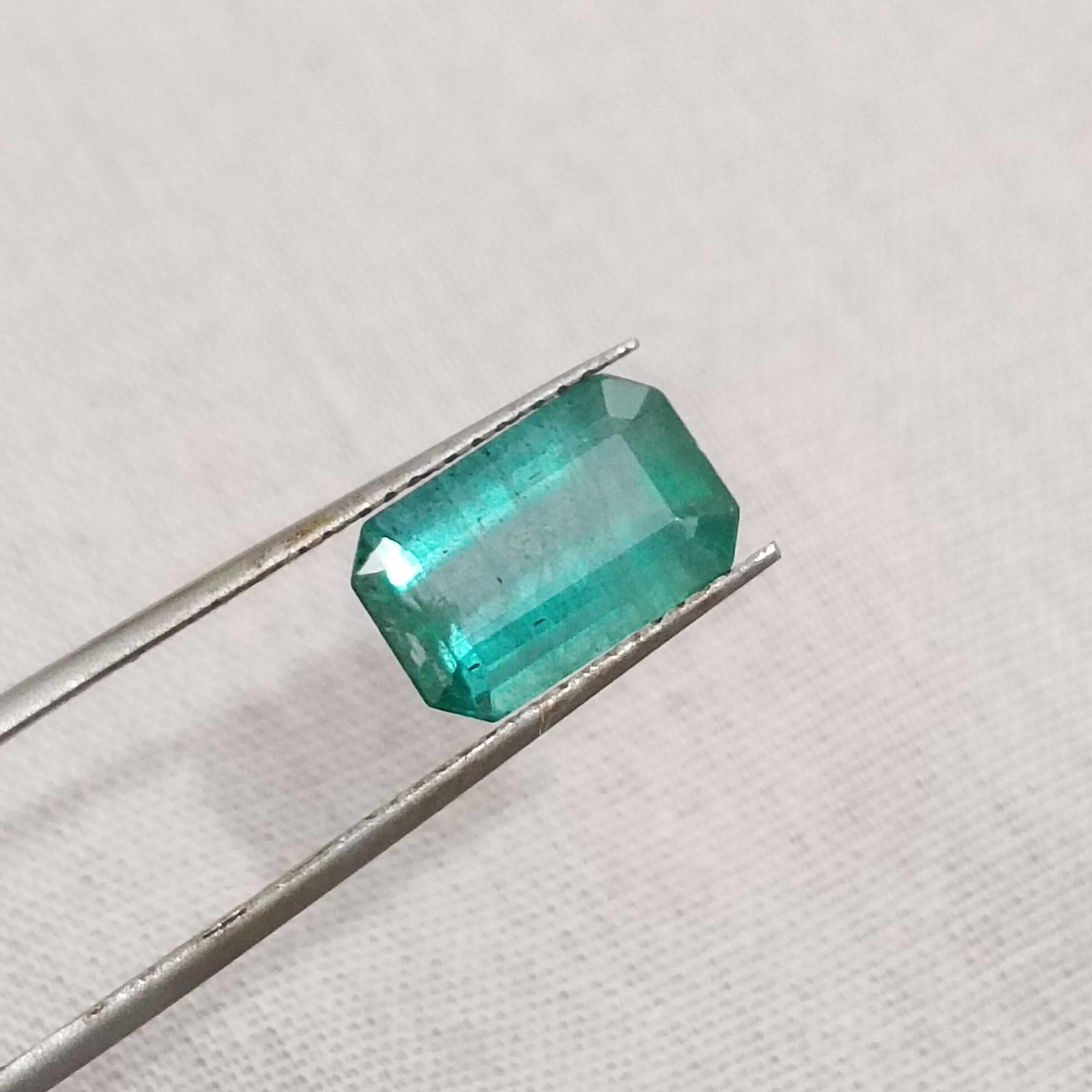 2.42ct deep medium green with blue tint octagon Zambian emerald