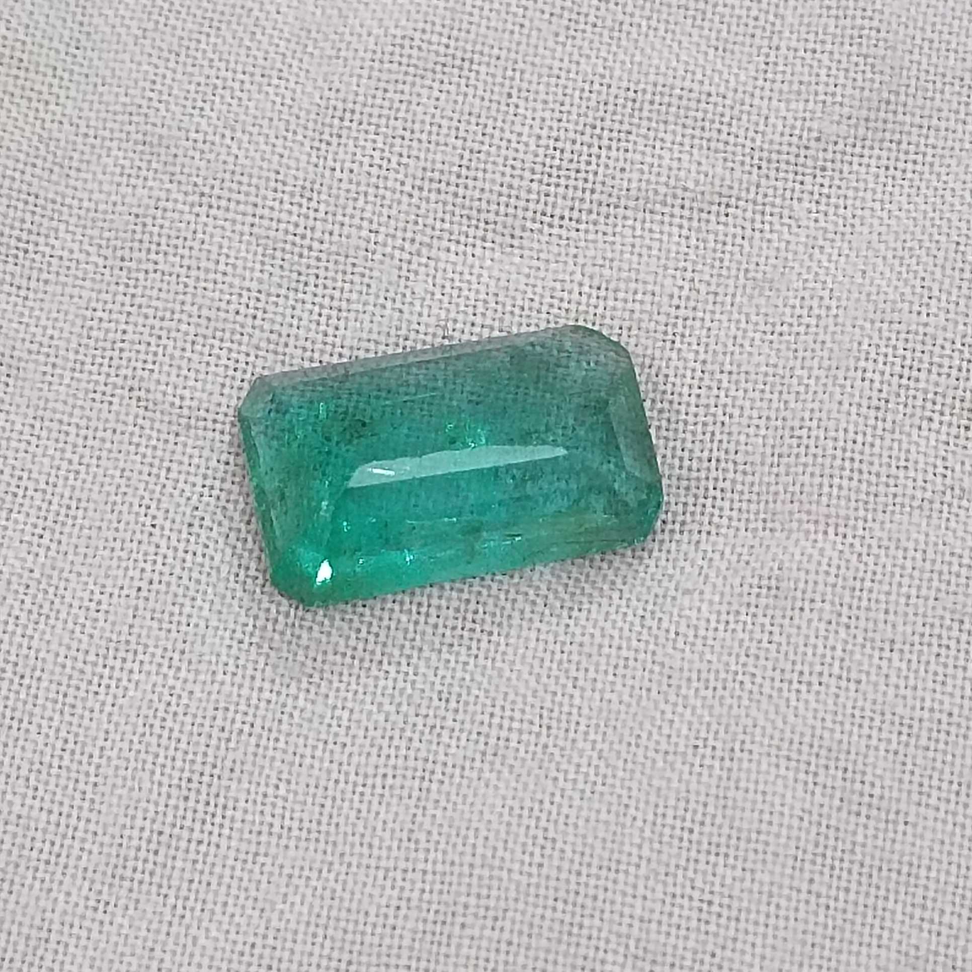 2.49ct medium deep green emerald cut emerald stone