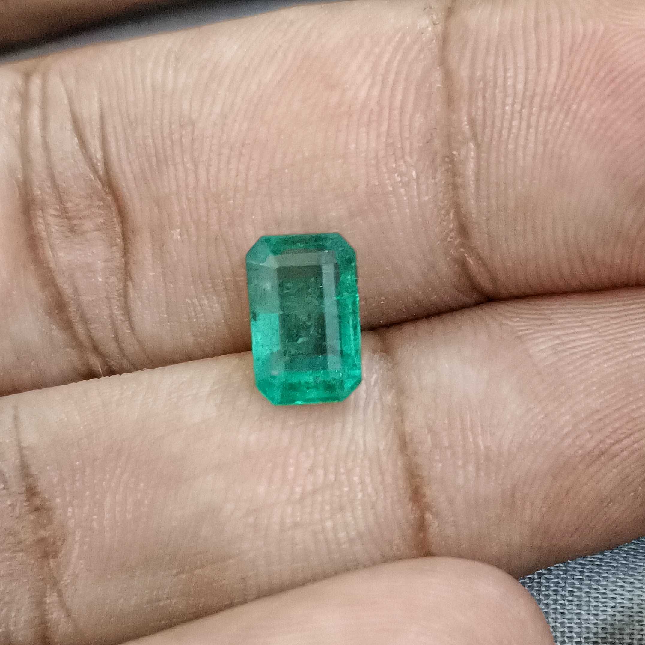 2.05ct bright golden green octagon emerald gemstone 