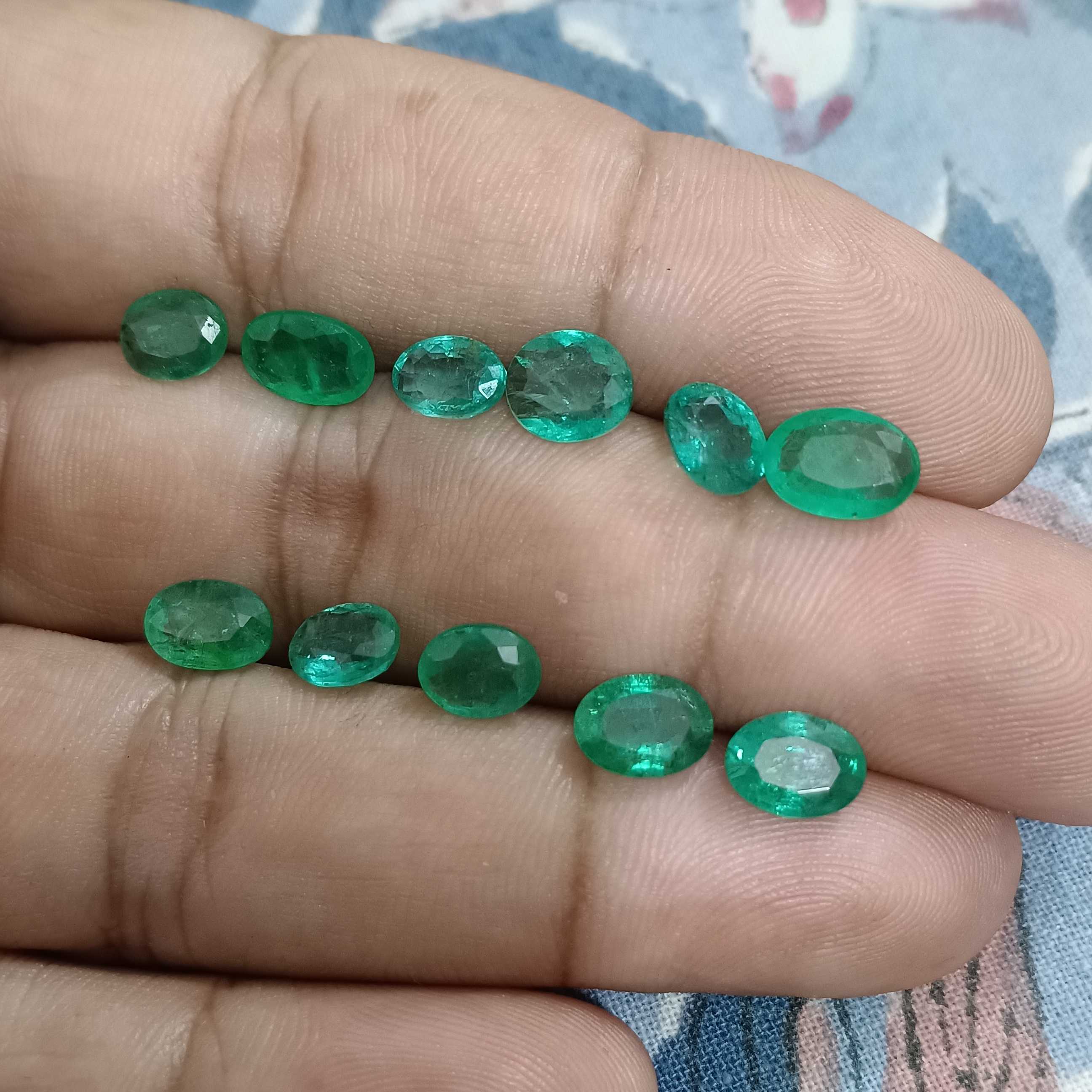 11.28ct oval cut emerald gemstone parcel