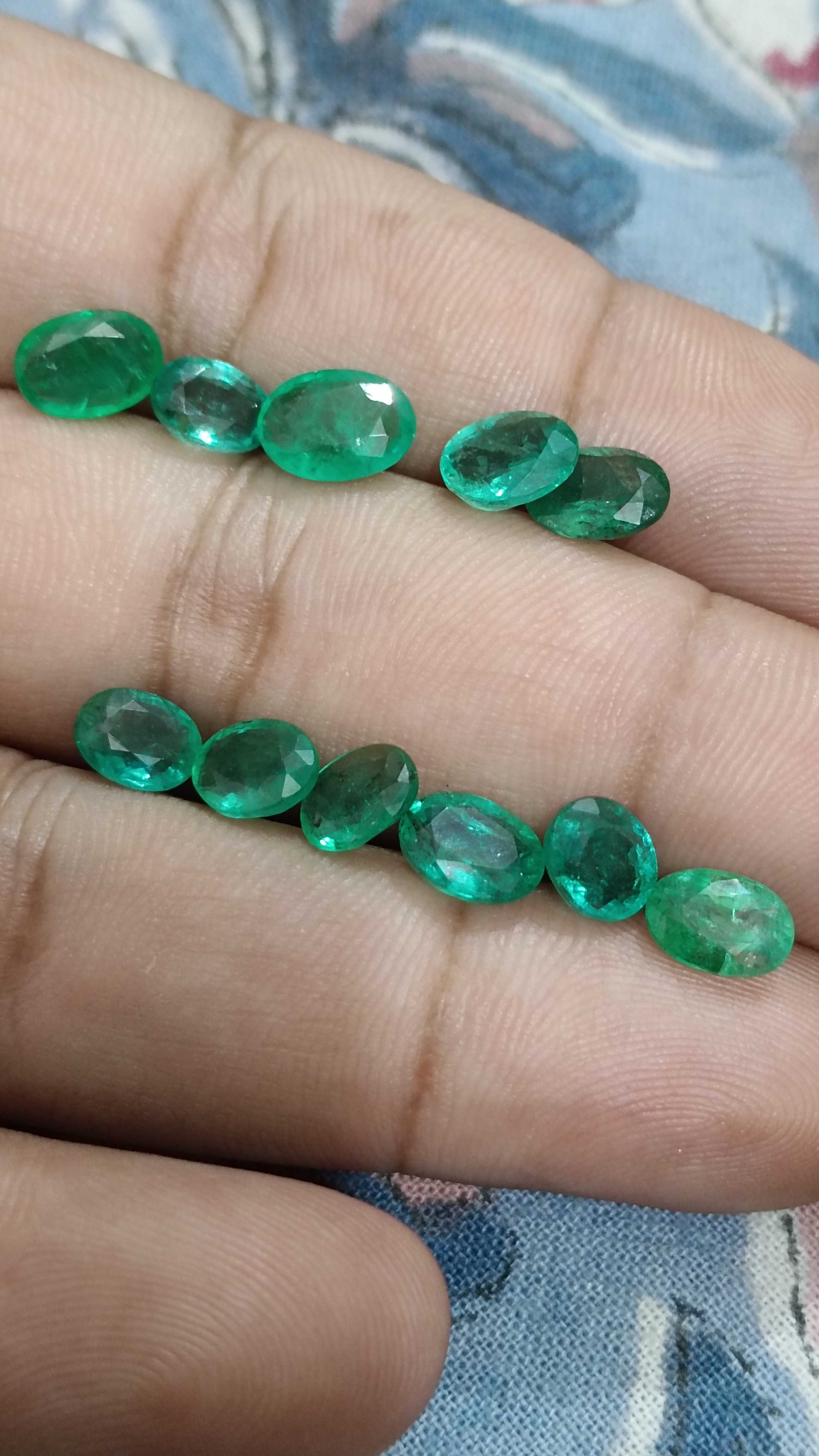 11.28ct oval cut emerald gemstone parcel