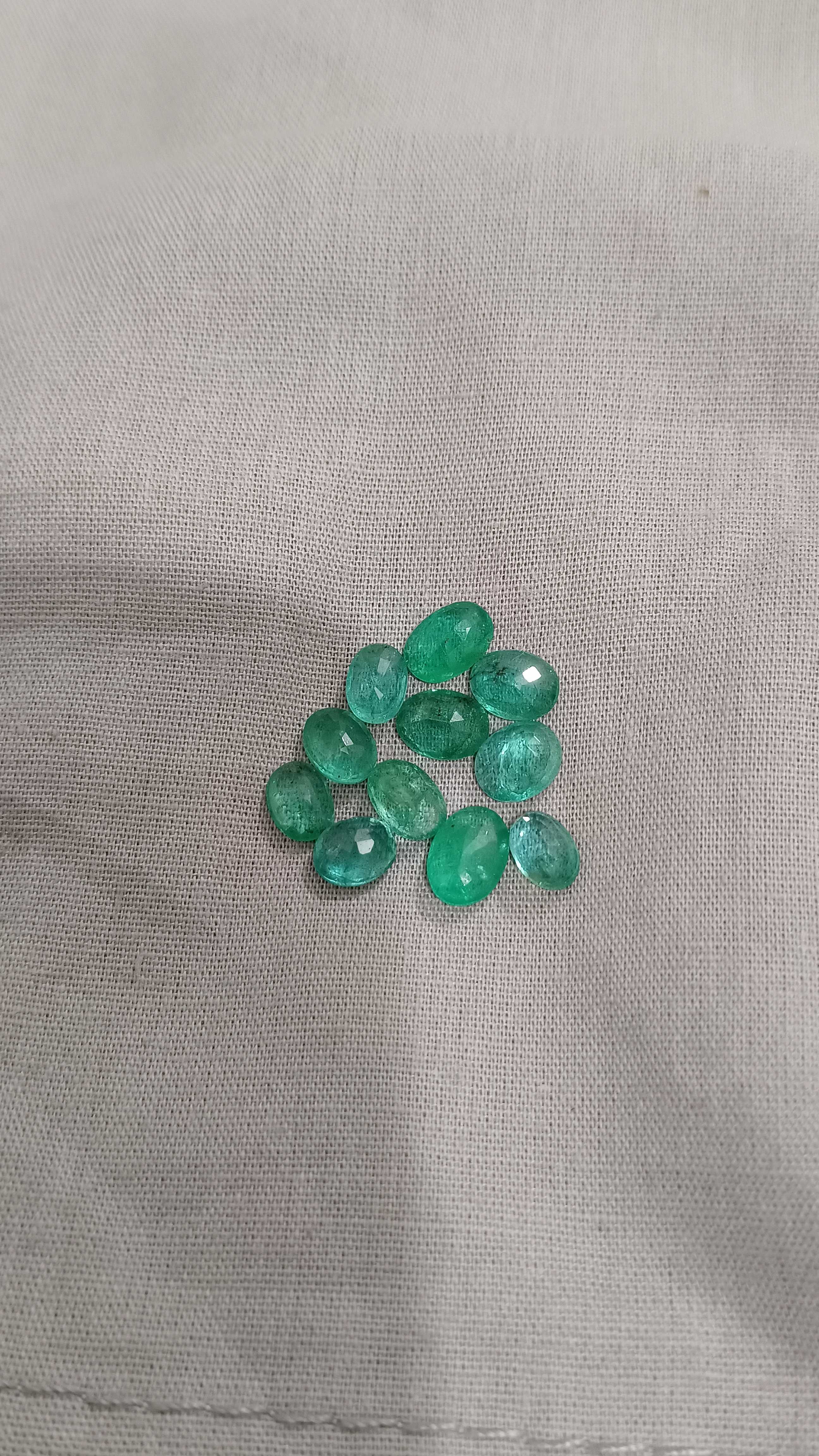 11.28ct oval cut emerald gemstone parcel