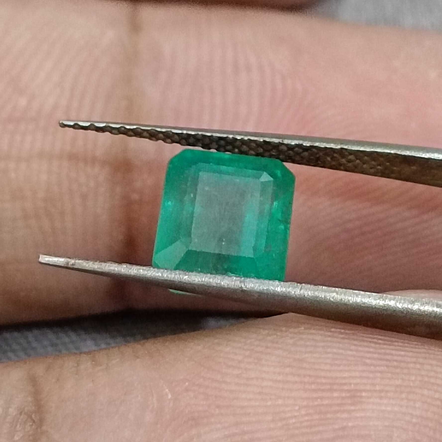 2.82ct medium goldn green shade emerald cut emerald