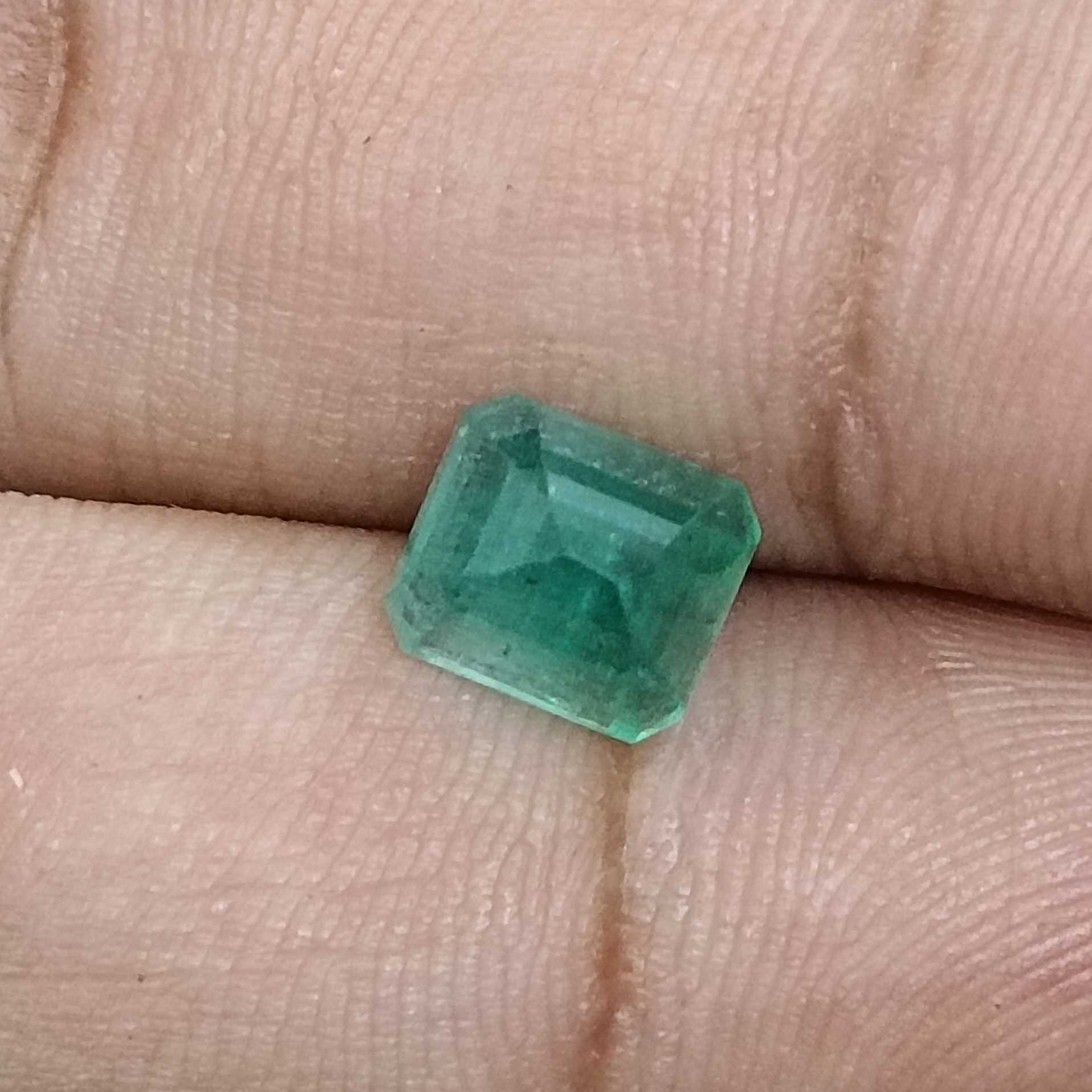 2.82ct medium goldn green shade emerald cut emerald