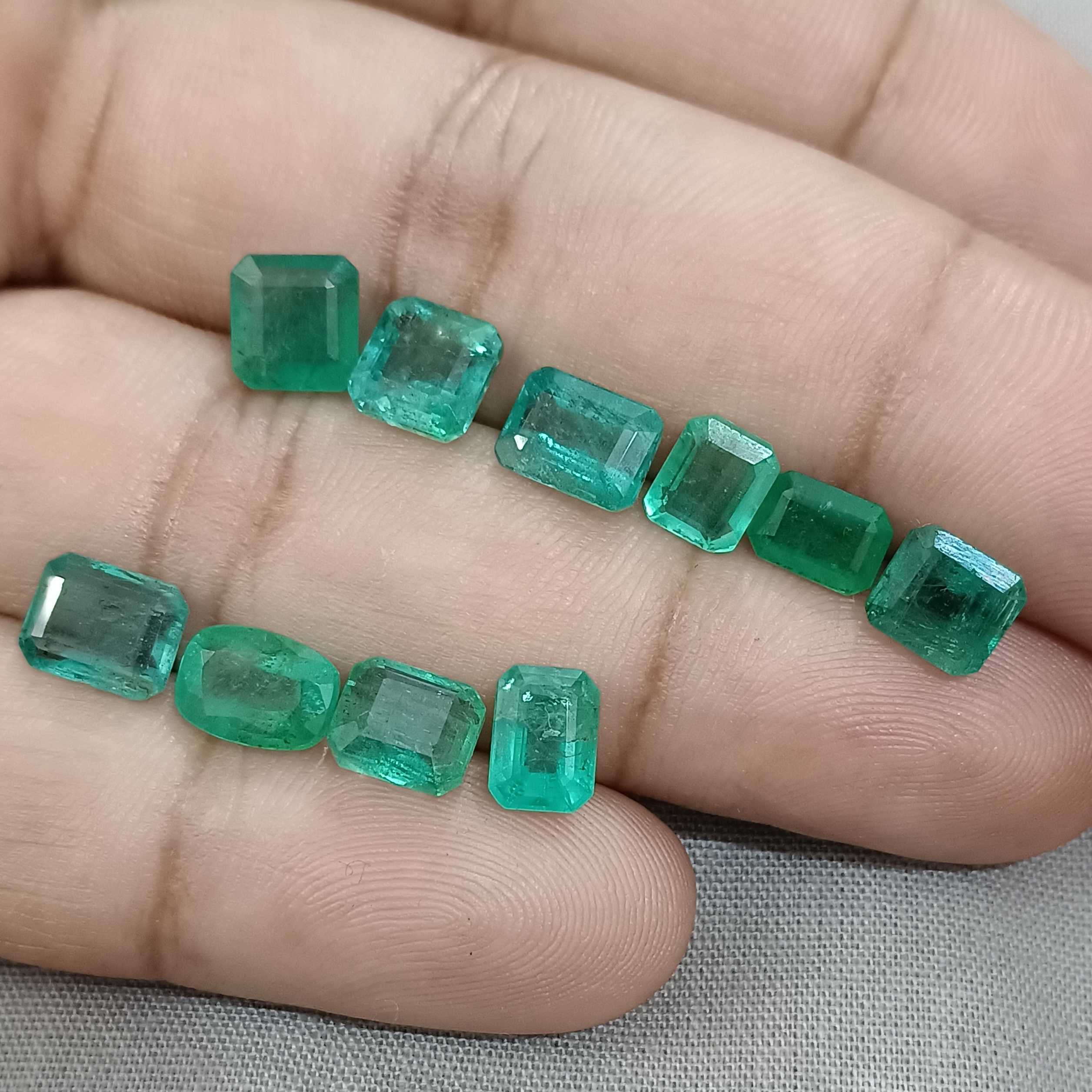 14.72ct golden green octagon cut emerald gem parcel