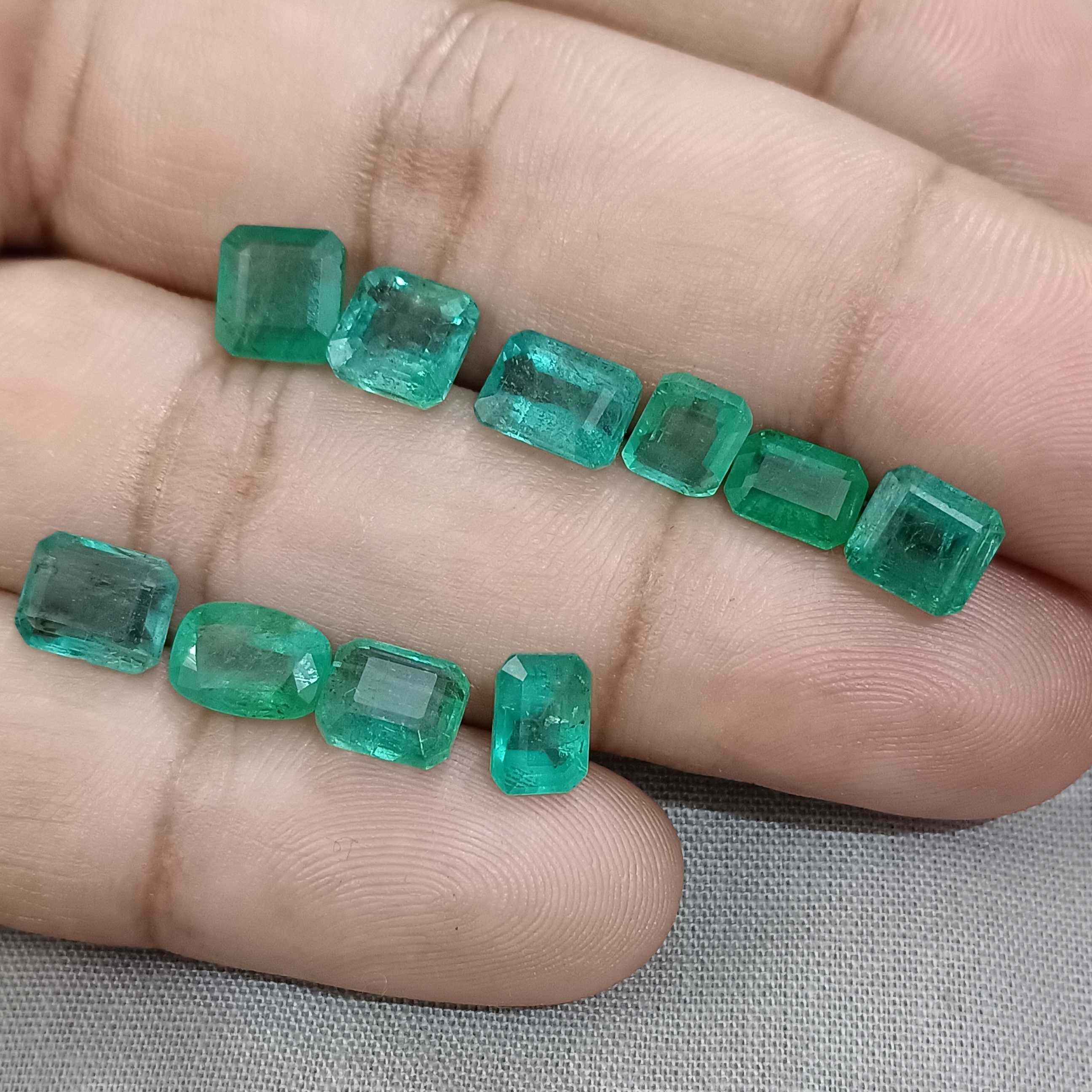 14.72ct golden green octagon cut emerald gem parcel