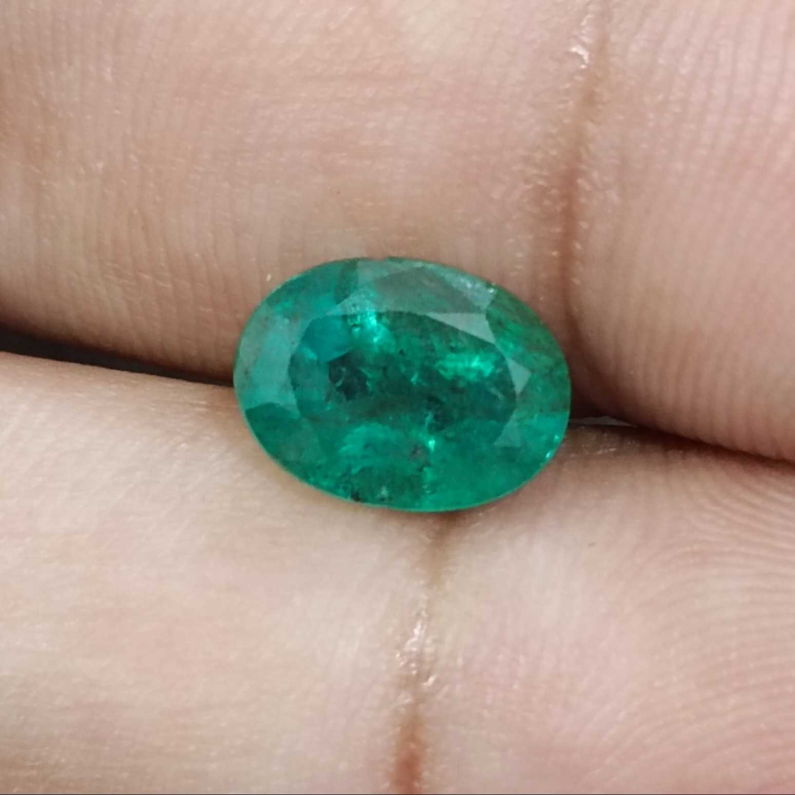 2.45ct deep forest green in gold tint oval cut emerald /