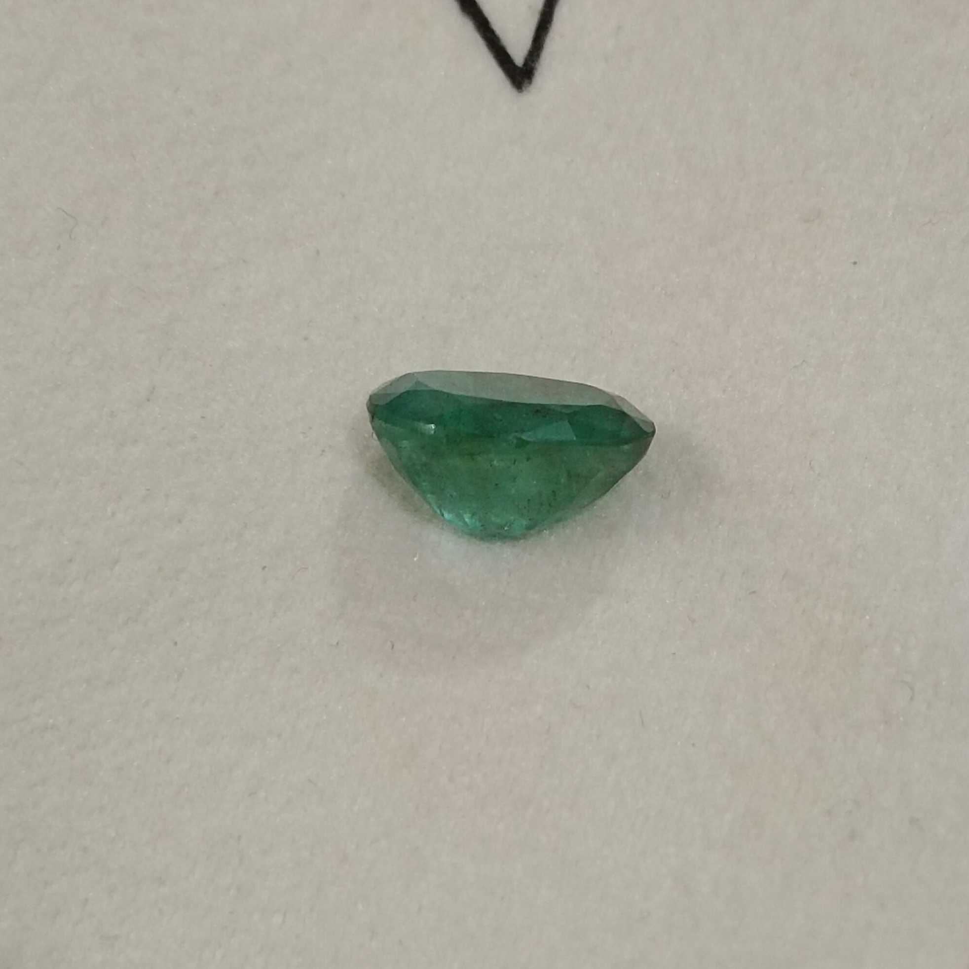 2.45ct deep forest green in gold tint oval cut emerald 