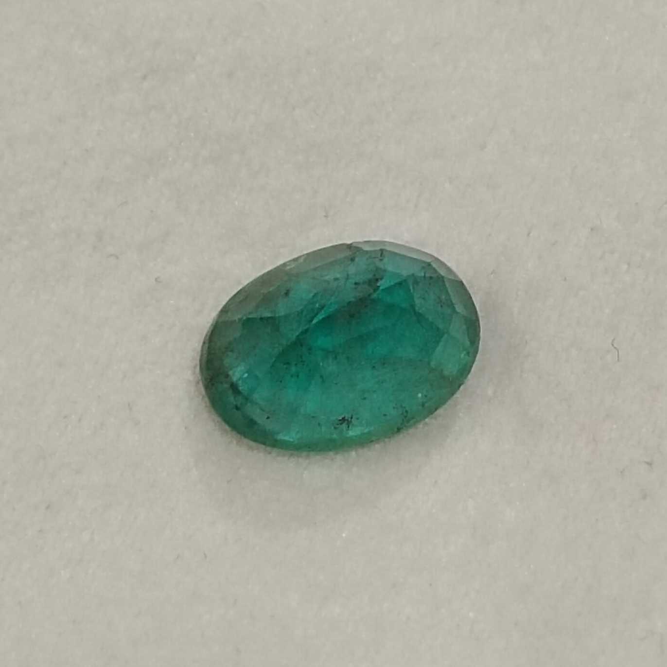 2.45ct deep forest green in gold tint oval cut emerald 