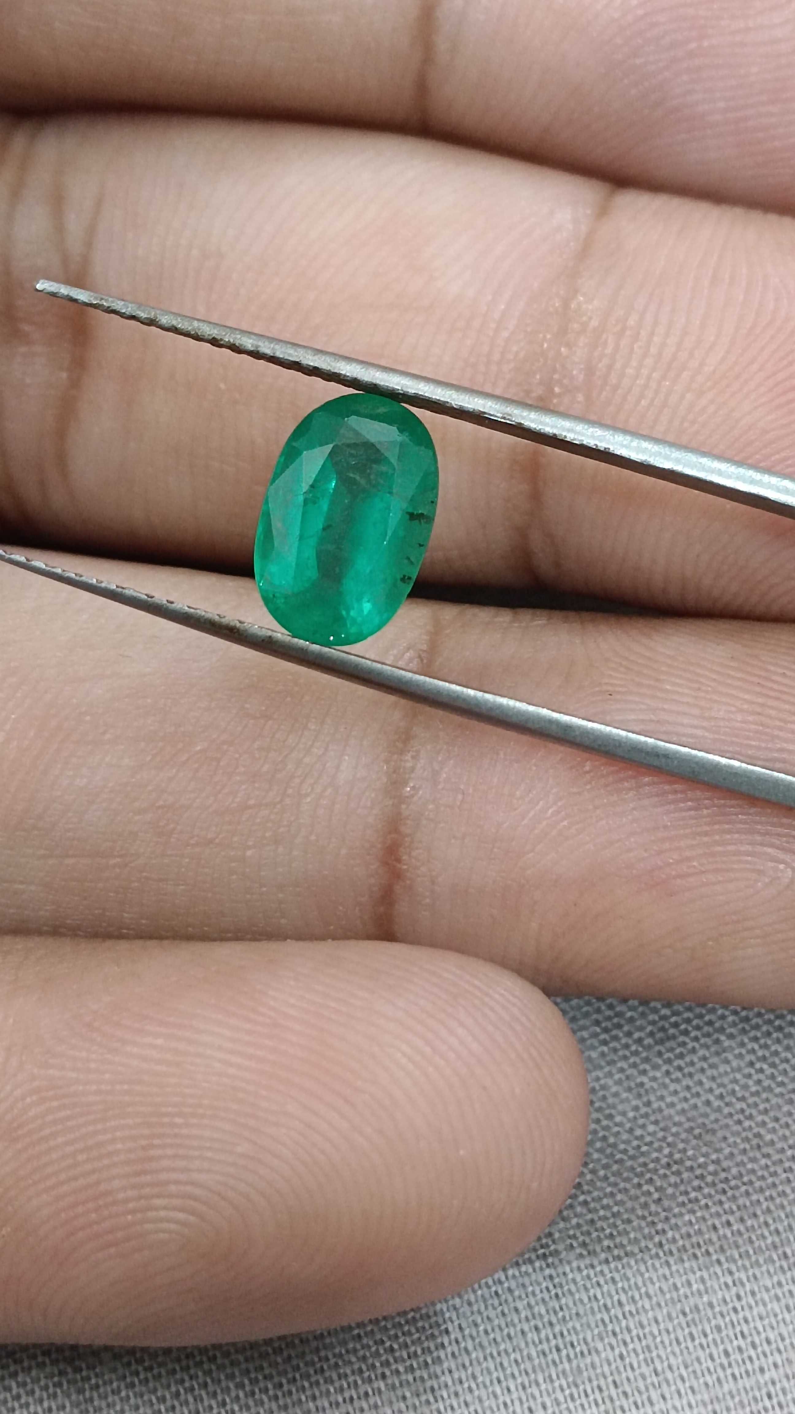 2.16ct misty golden green oval cut Colombian emerald gem