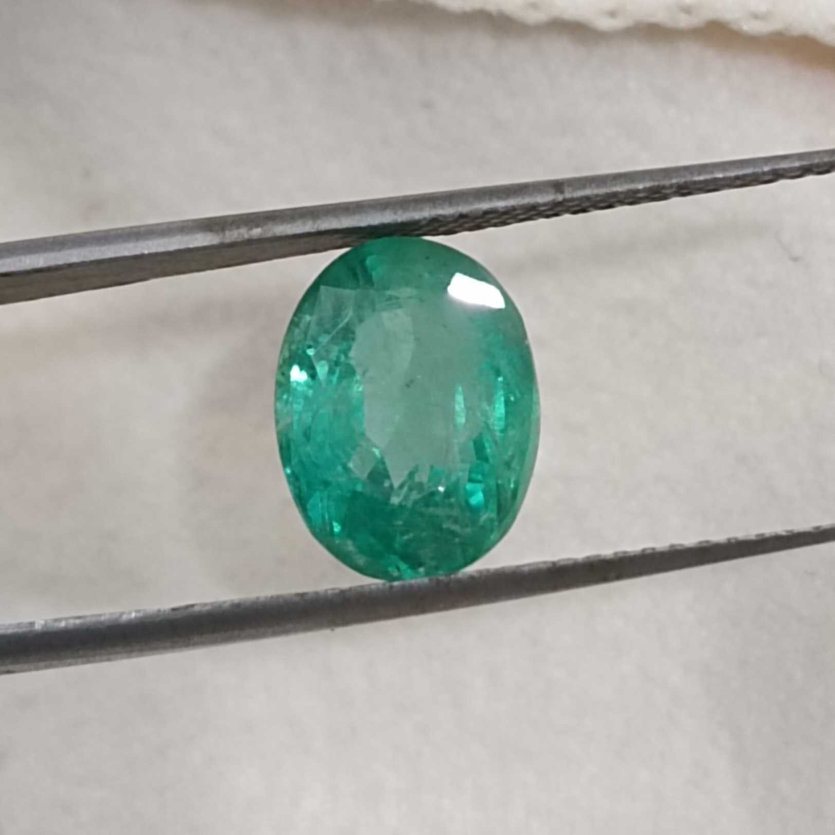 2.81ct bright grape green oval cut emerald /