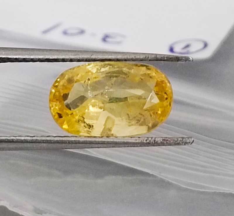 3.01ct vivid golden yellow oval cut yellow sapphire 