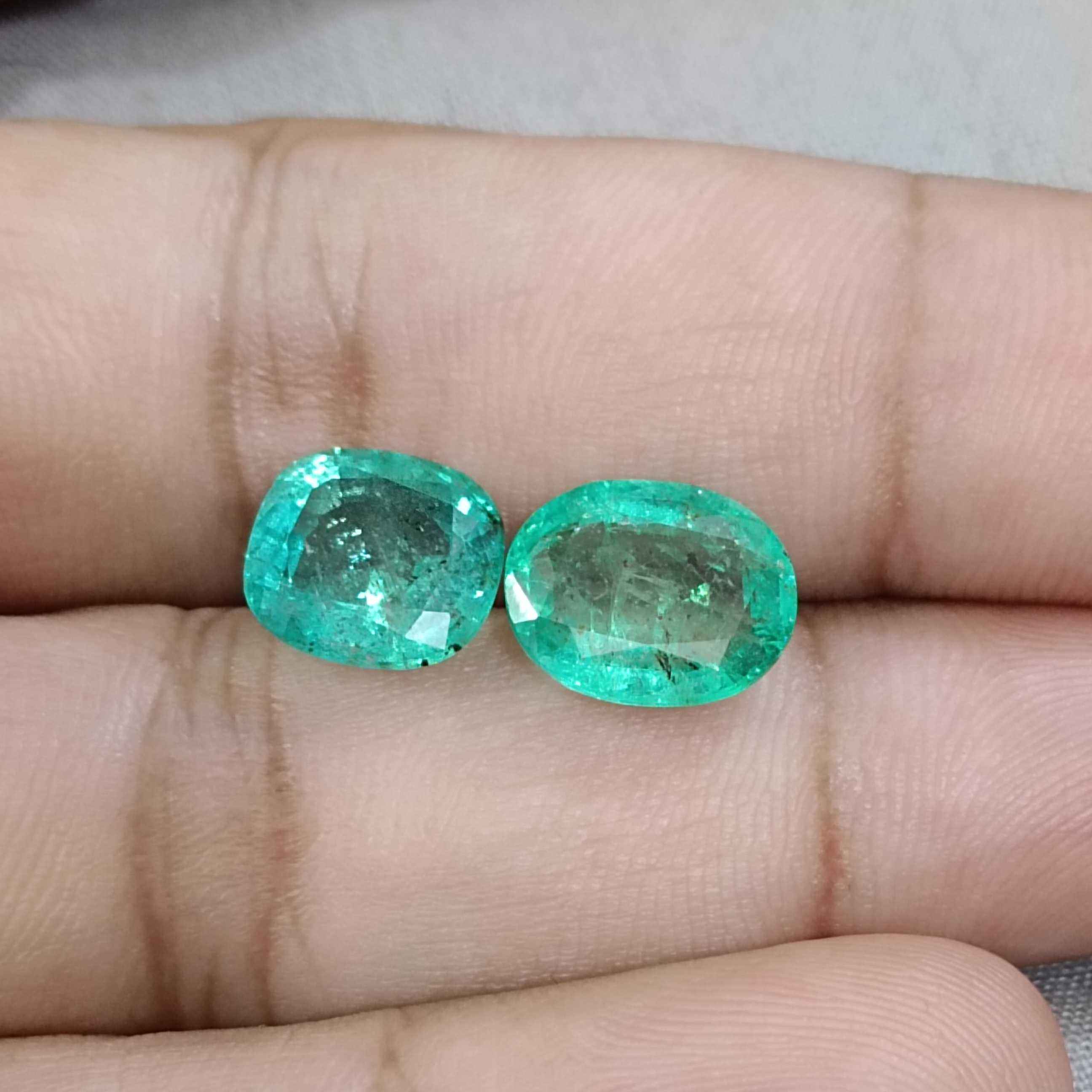 6.71ct 2pcs pastel color pastel green emeralds