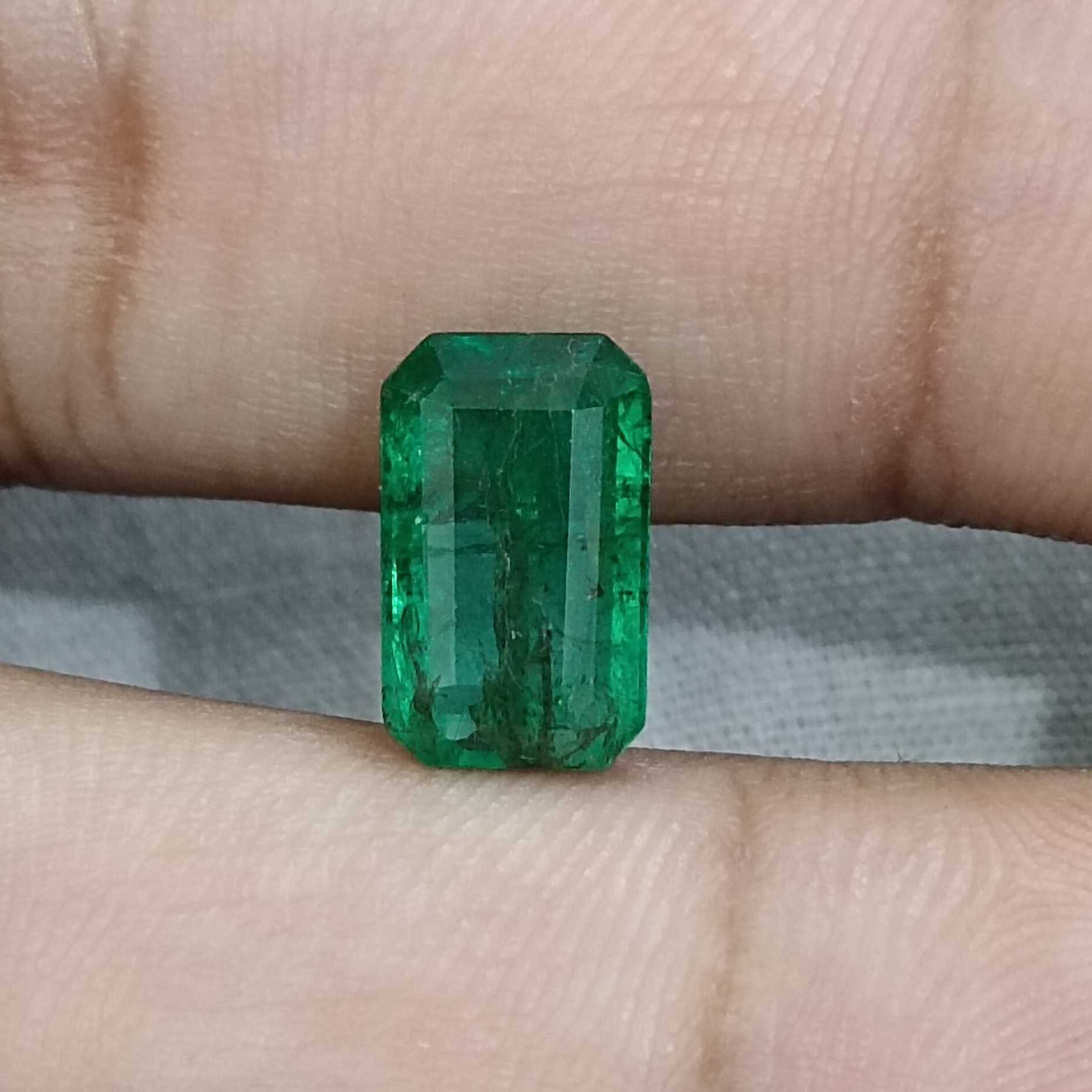 3.55ct deep vivid green octagon emerald gemstone /