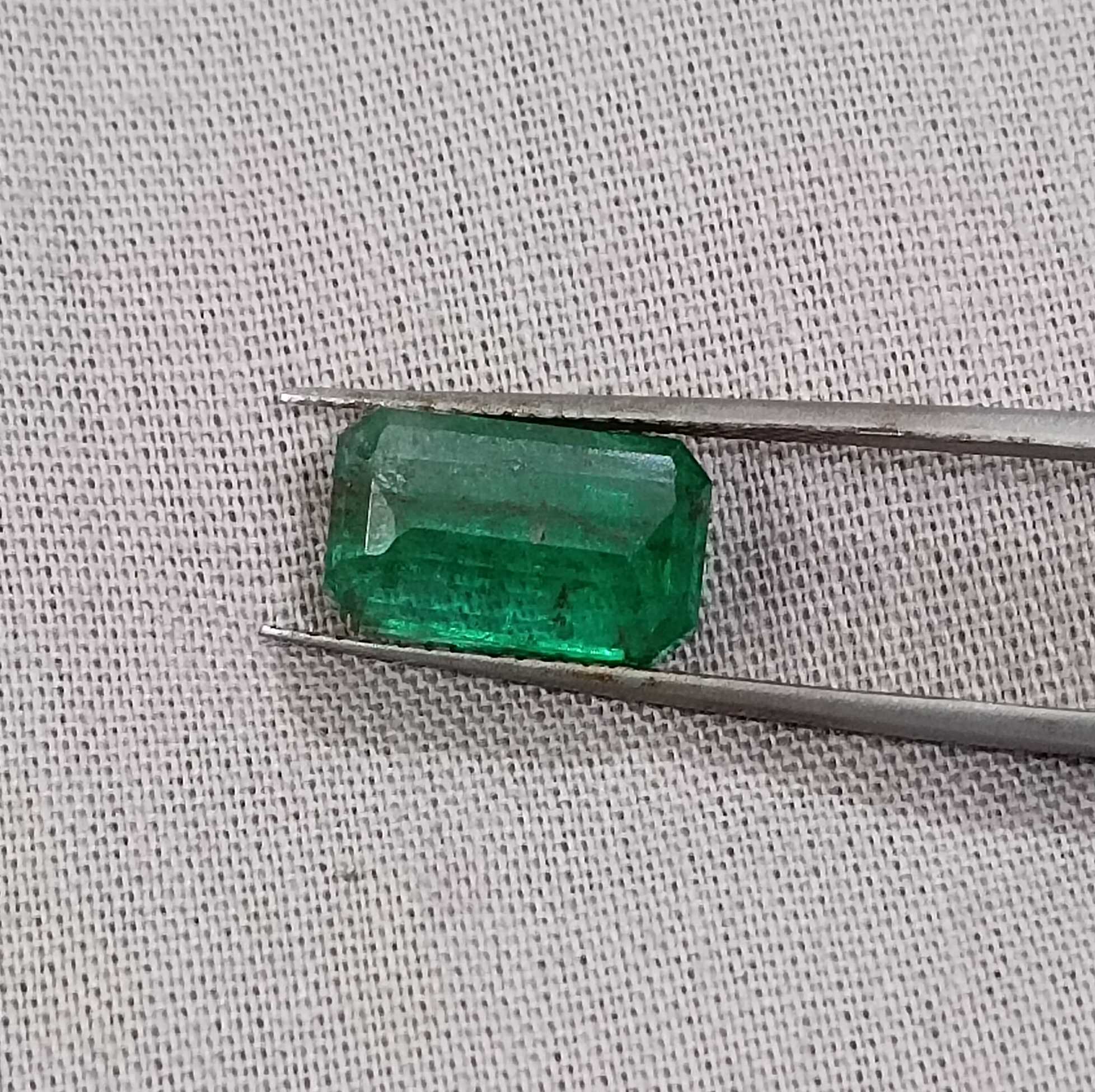 3.55ct deep vivid green octagon emerald gemstone 