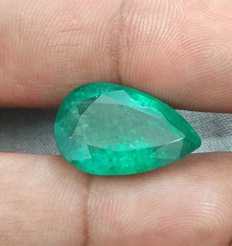 13.47ct bright golden green pear cut emerald gemstone 