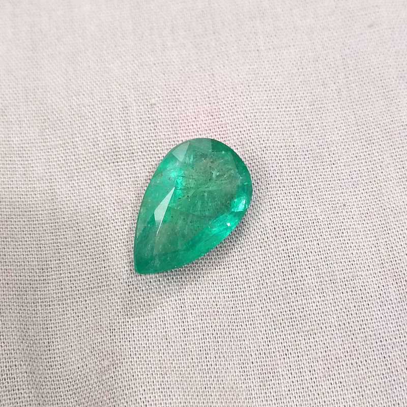 13.47ct bright golden green pear cut emerald gemstone 