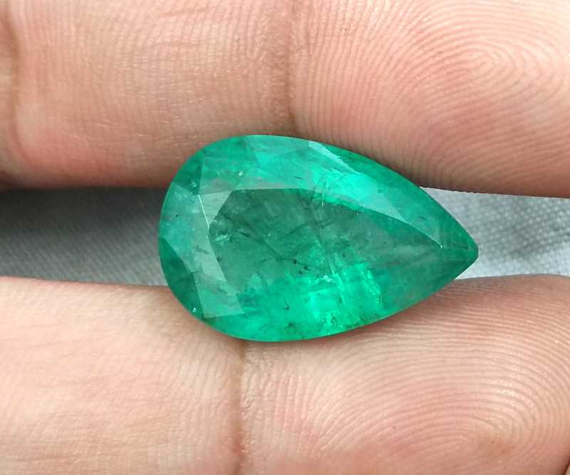 13.47ct bright golden green pear cut emerald gemstone 