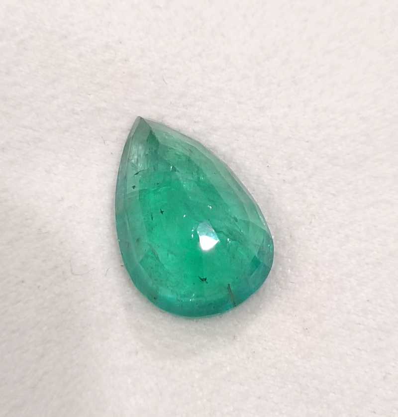 13.47ct bright golden green pear cut emerald gemstone 