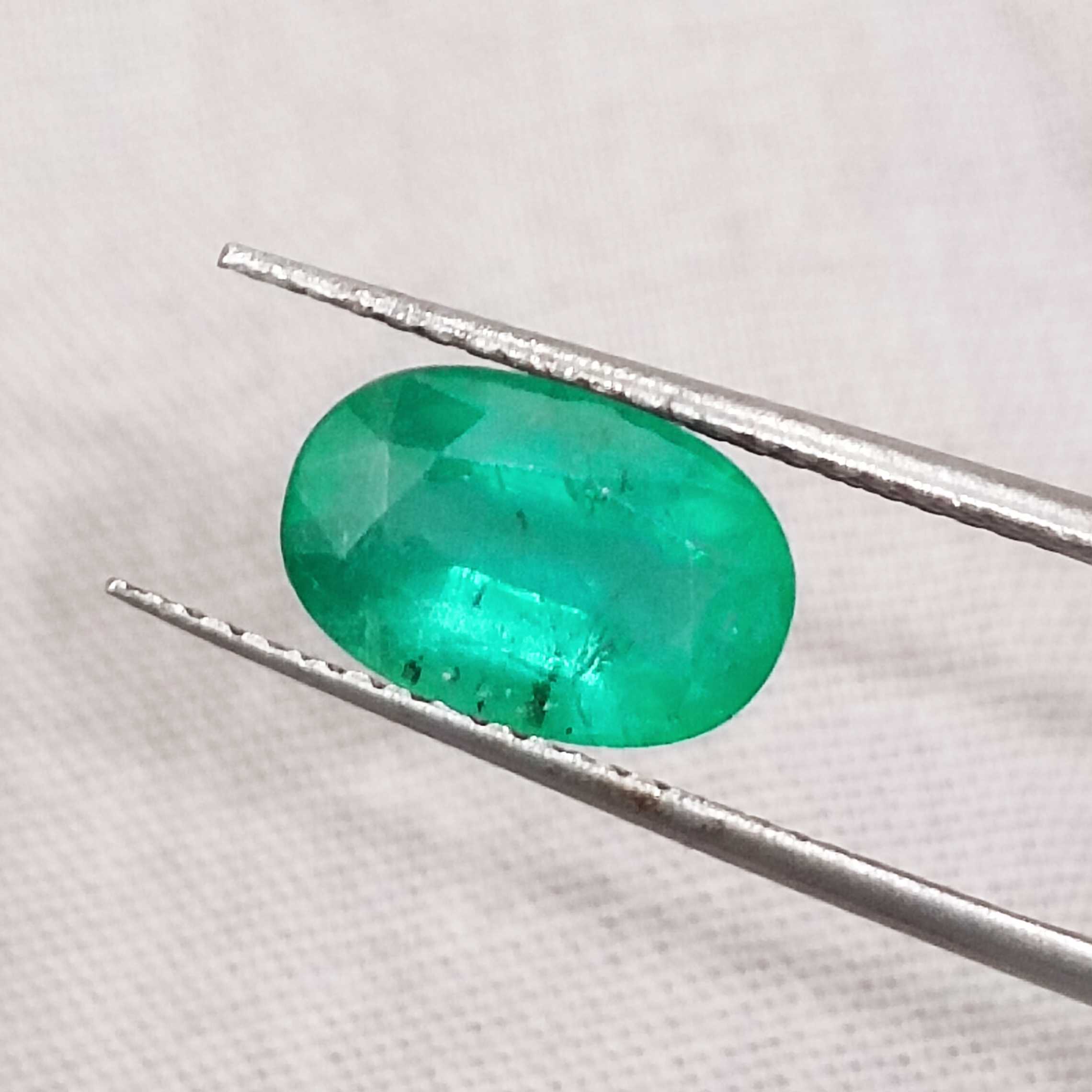 2.16ct GSI certified misty golden green oval cut Colombian emerald gem