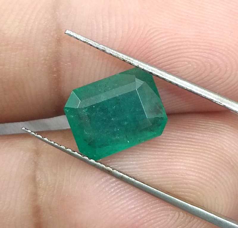 4.46ct medium green emerald cut emerald /