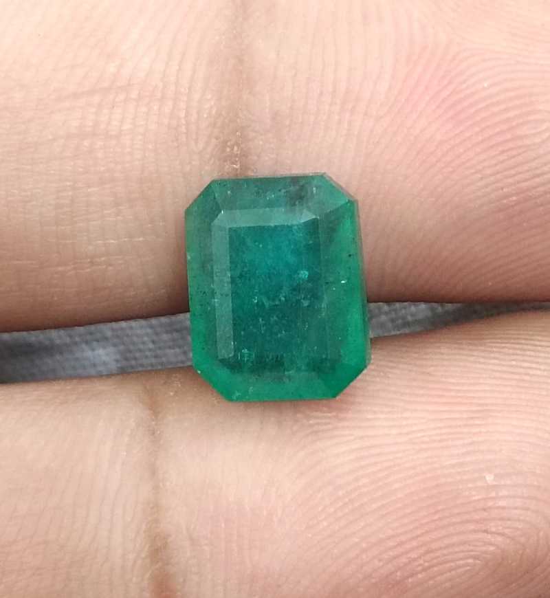 4.46ct medium green emerald cut emerald 