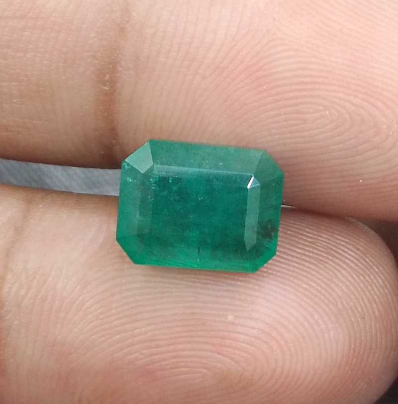 4.46ct medium green emerald cut emerald 