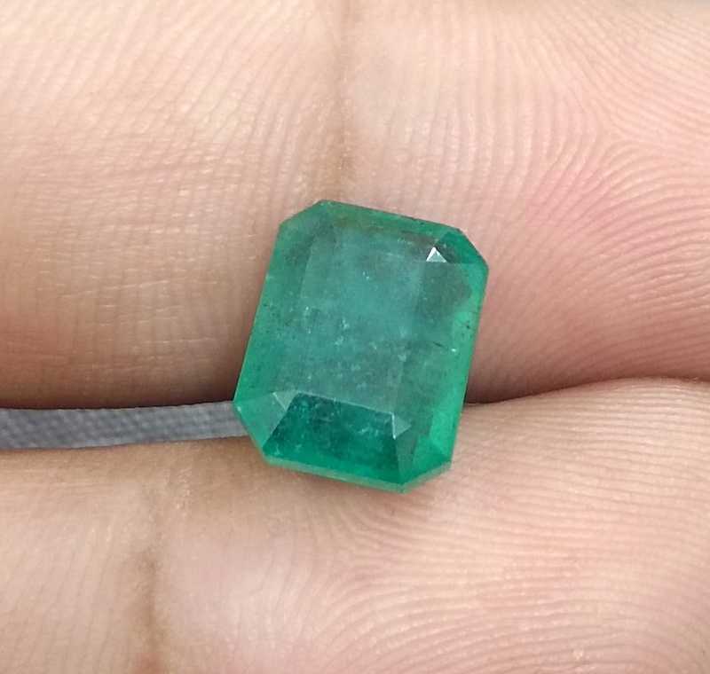 4.46ct medium green emerald cut emerald 