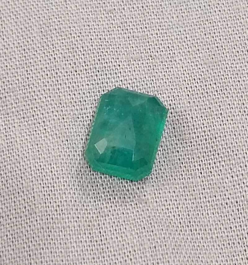 4.46ct medium green emerald cut emerald 