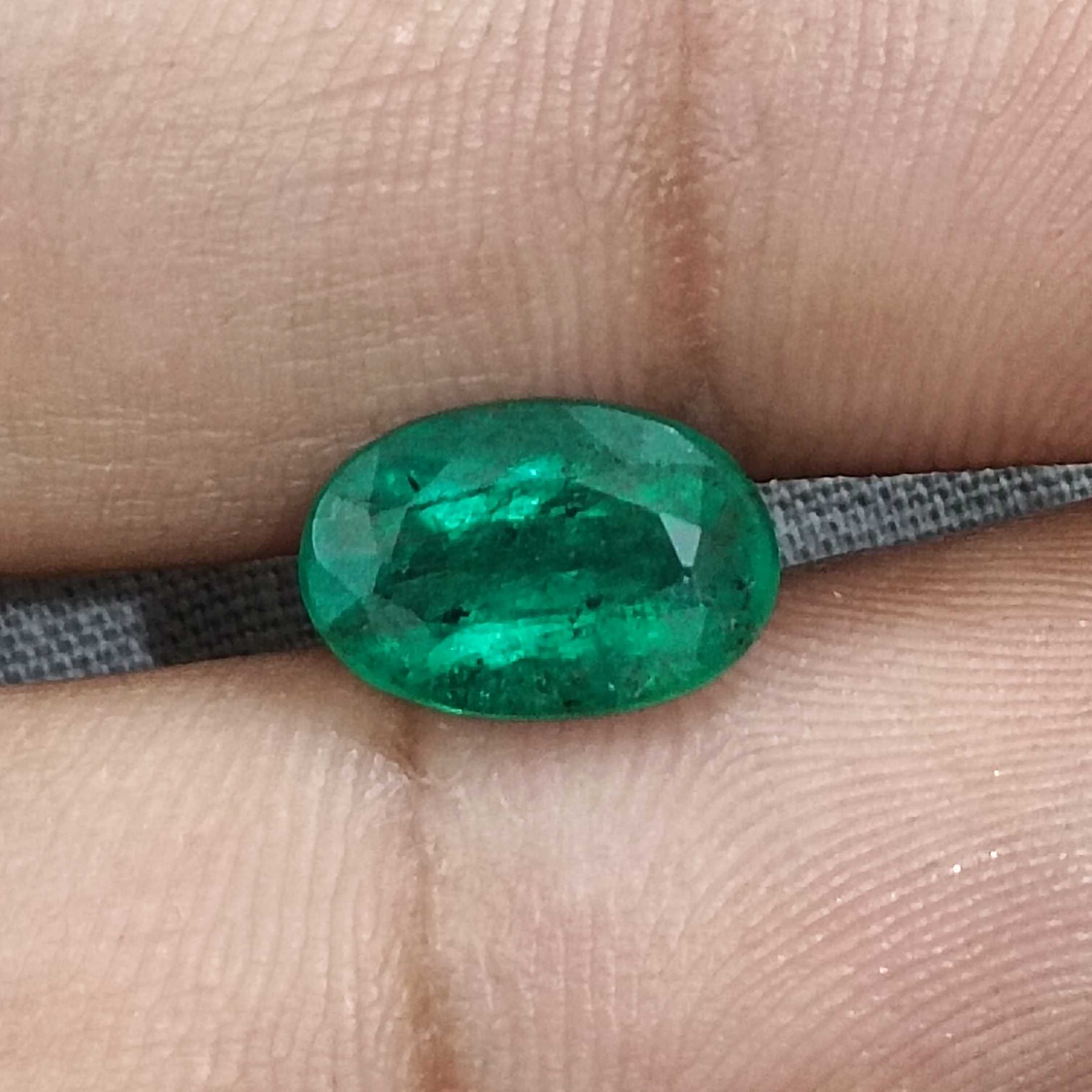 2.40ct vivid golden green oval cut Zambian emerald/