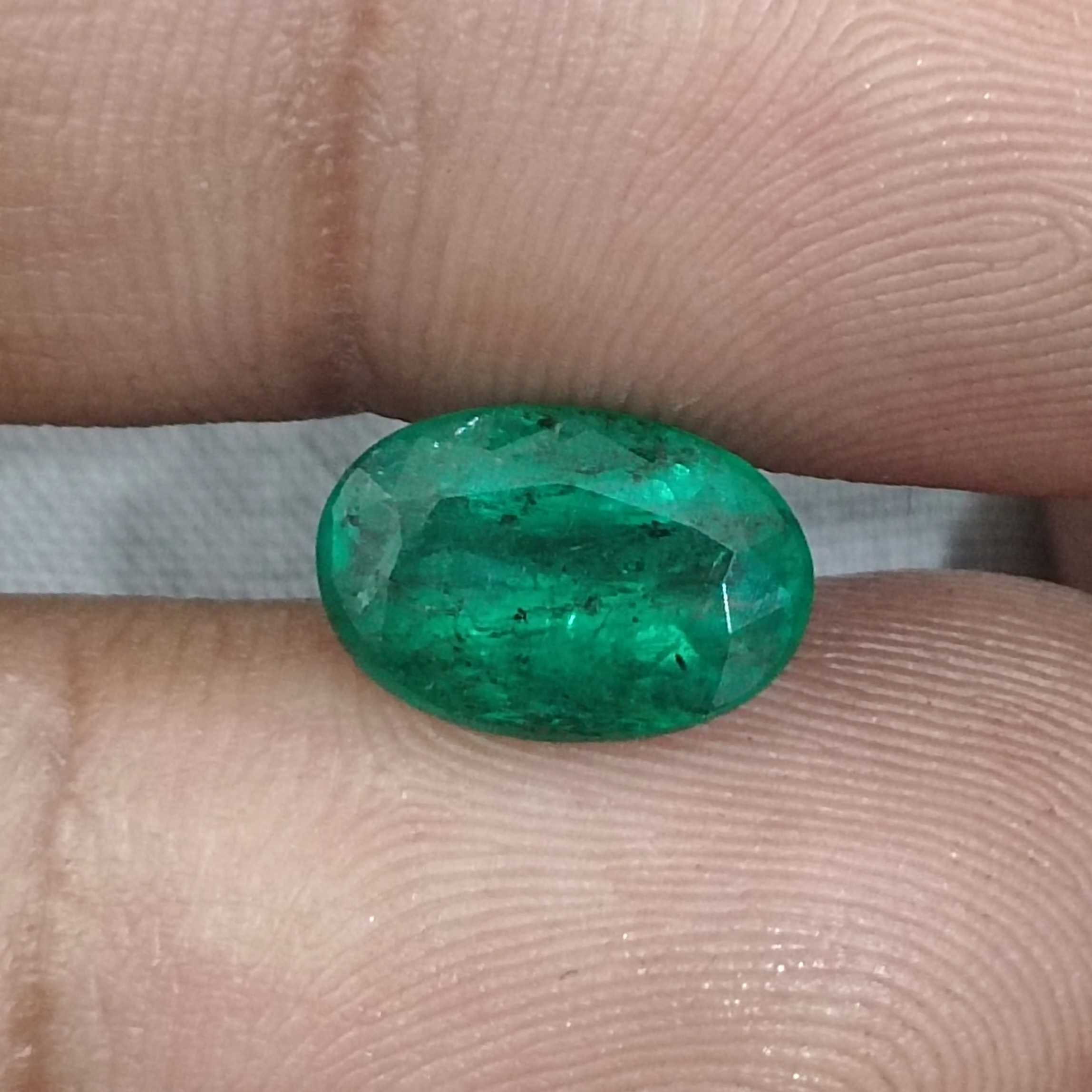 2.40ct vivid golden green oval cut Zambian emerald