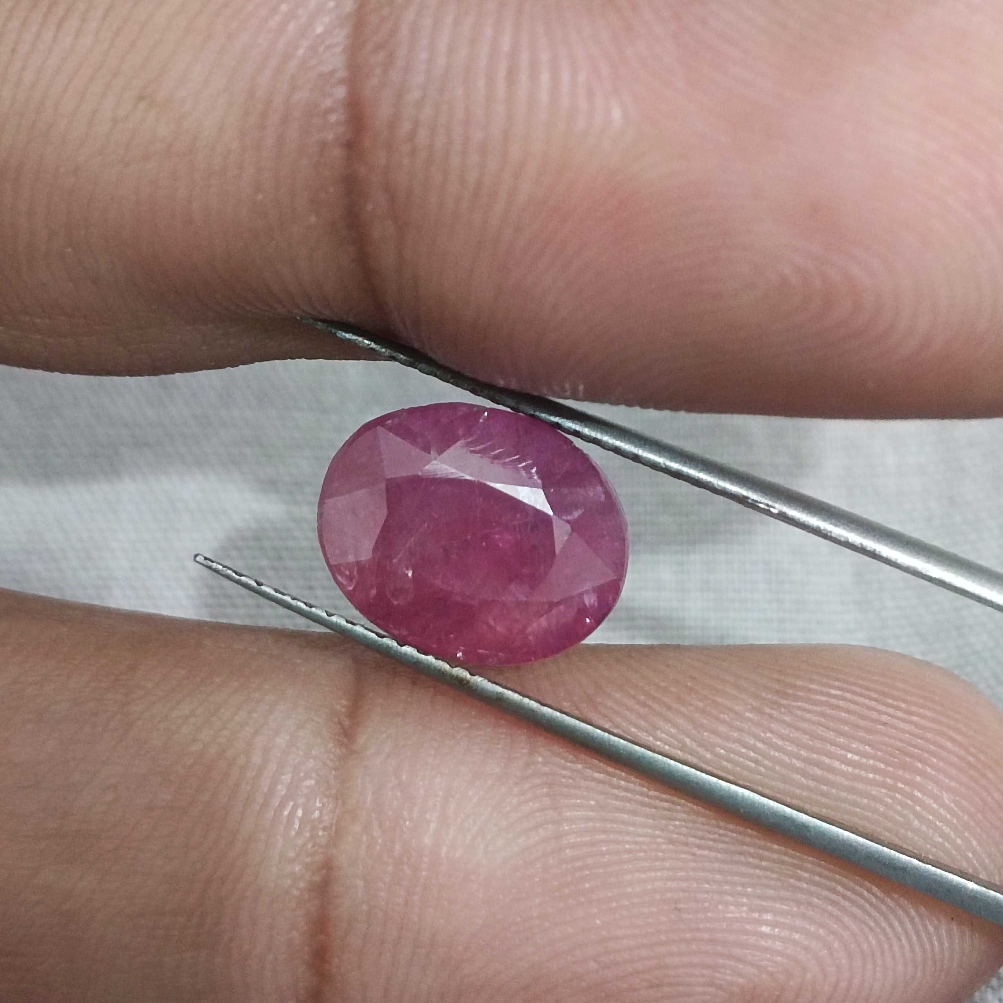 5.00 carat GSI certified deep maroon red oval cut African origin ruby 