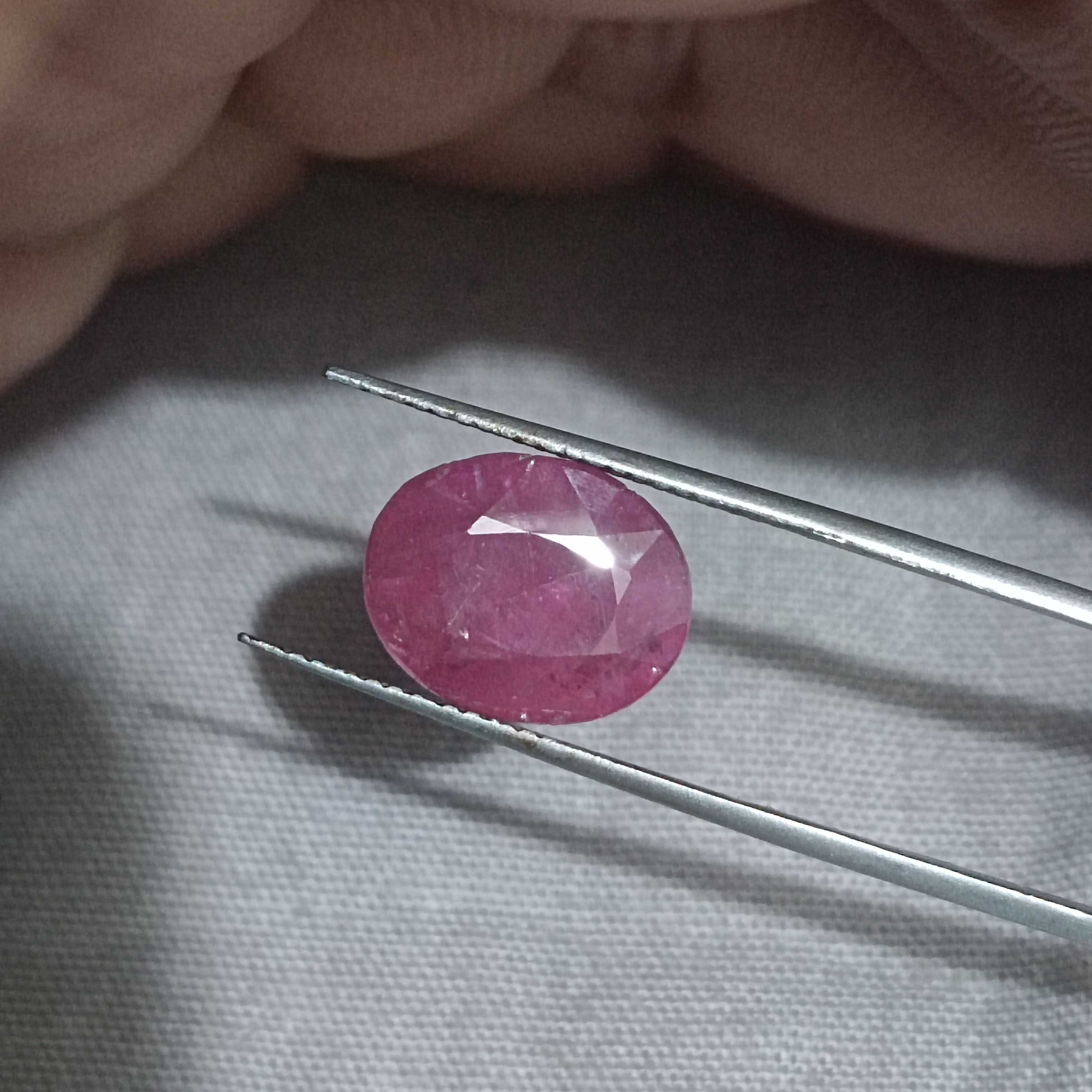 5.00 carat GSI certified deep maroon red oval cut African origin ruby 