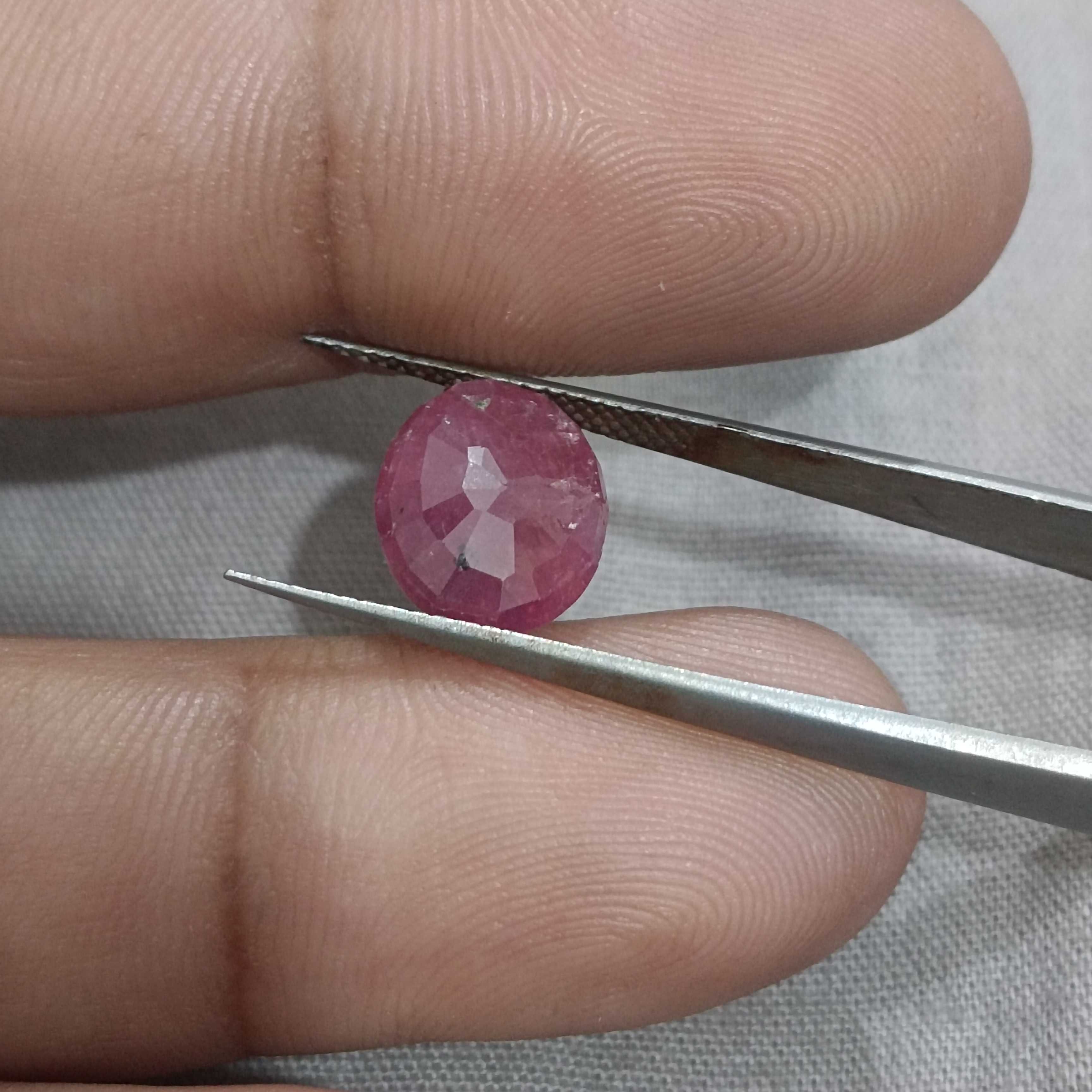 5.00 carat GSI certified deep maroon red oval cut African origin ruby 