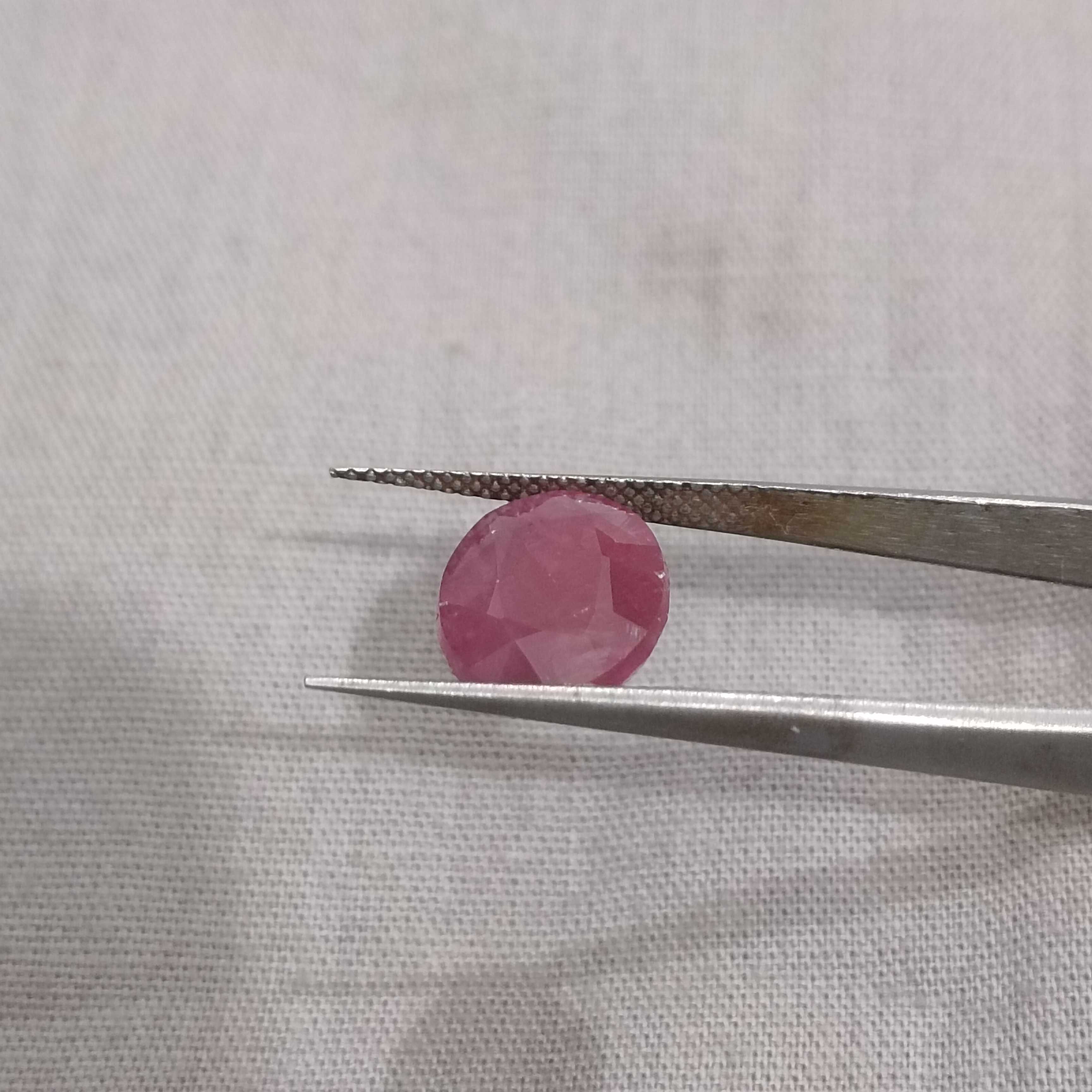 5.00 carat GSI certified deep maroon red oval cut African origin ruby 