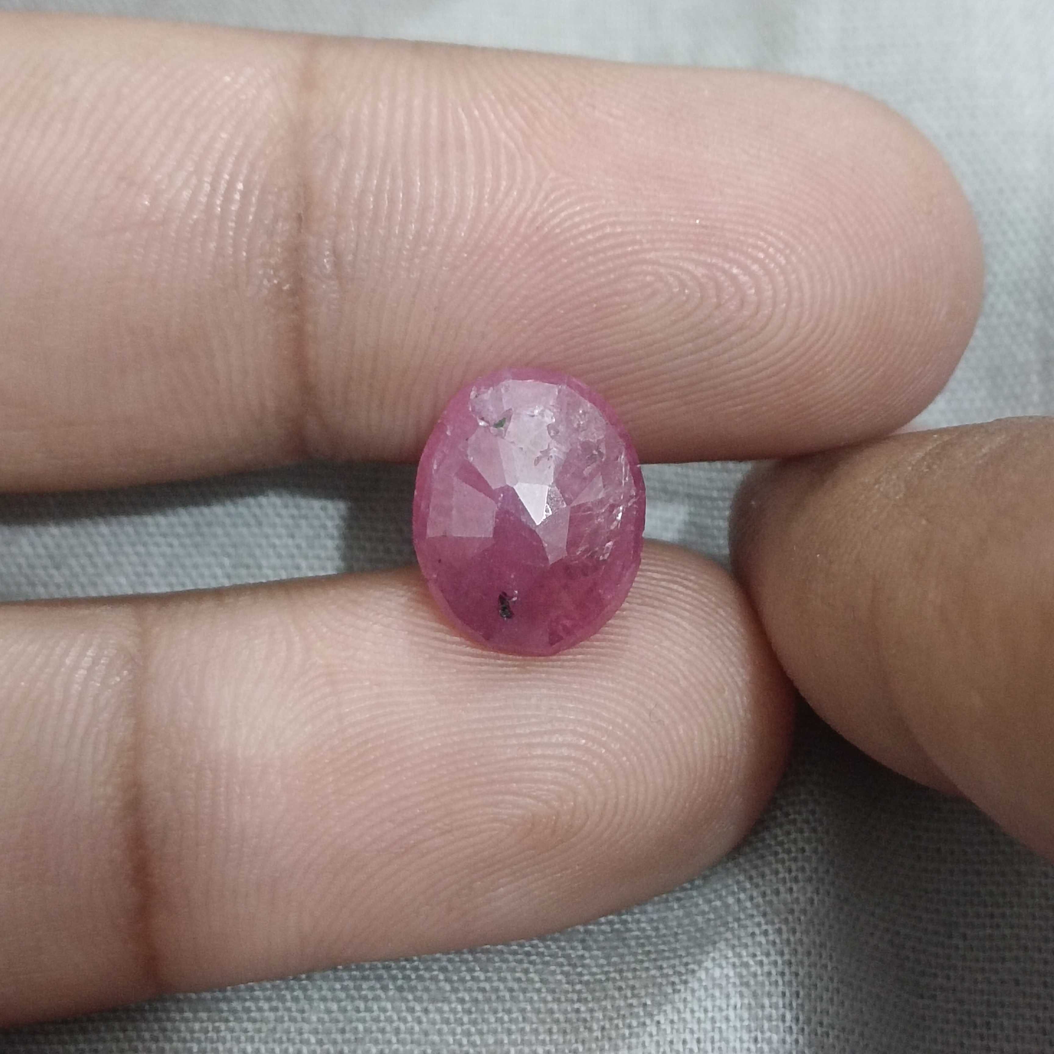 5.00 carat GSI certified deep maroon red oval cut African origin ruby 