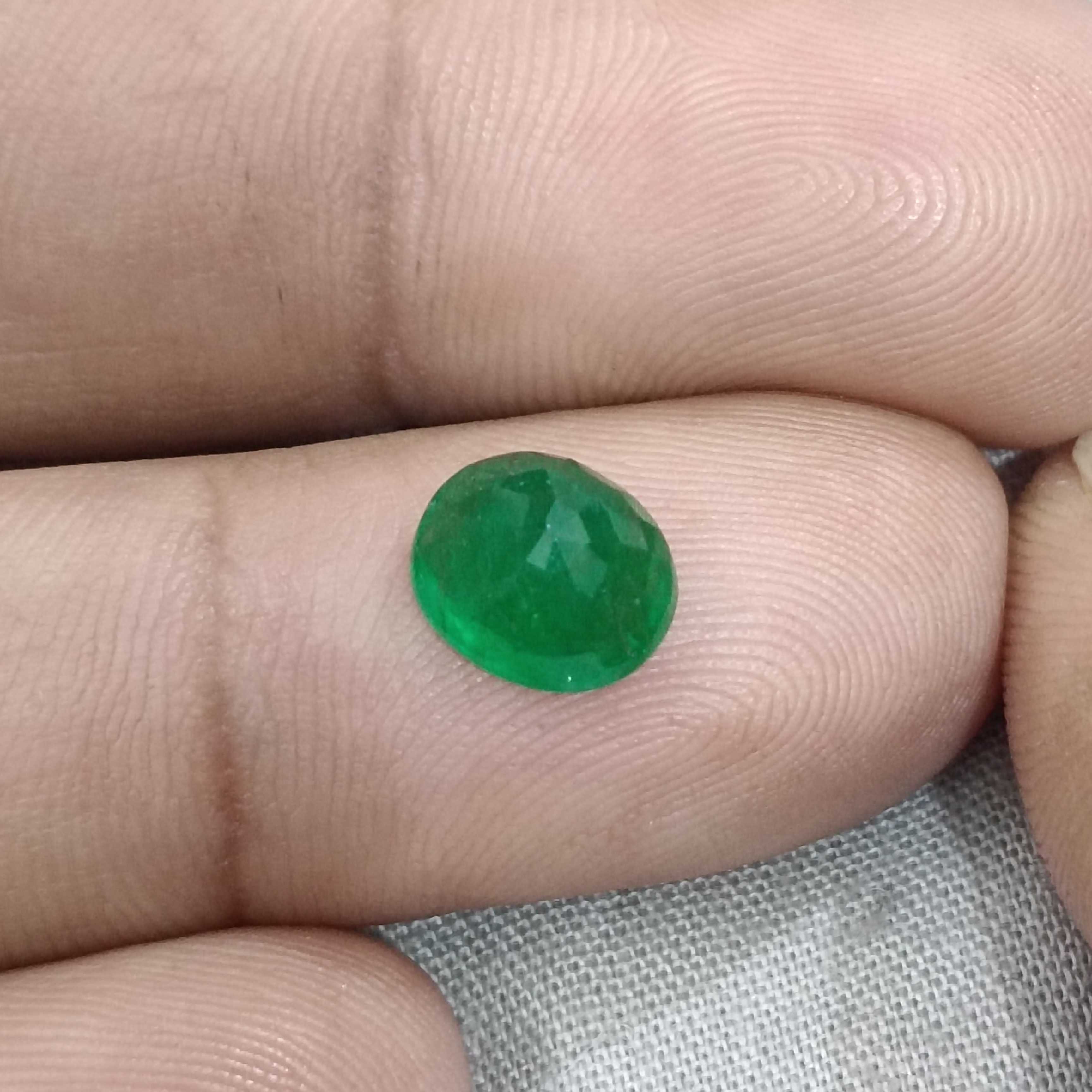 2.10ct certified deep green oval shape Zambian emerald gemstone 