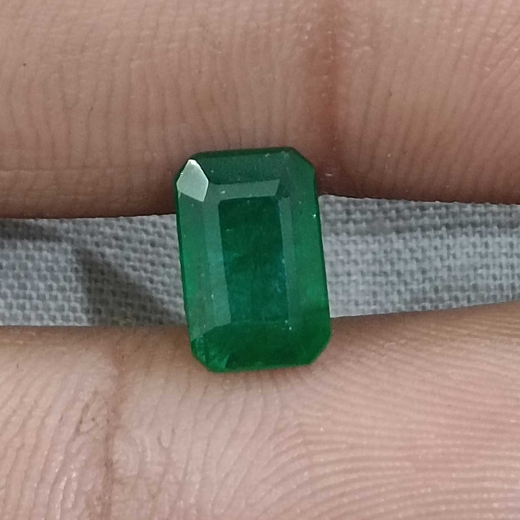 1.69ct certified deep green octagon cut emerald gemstone /