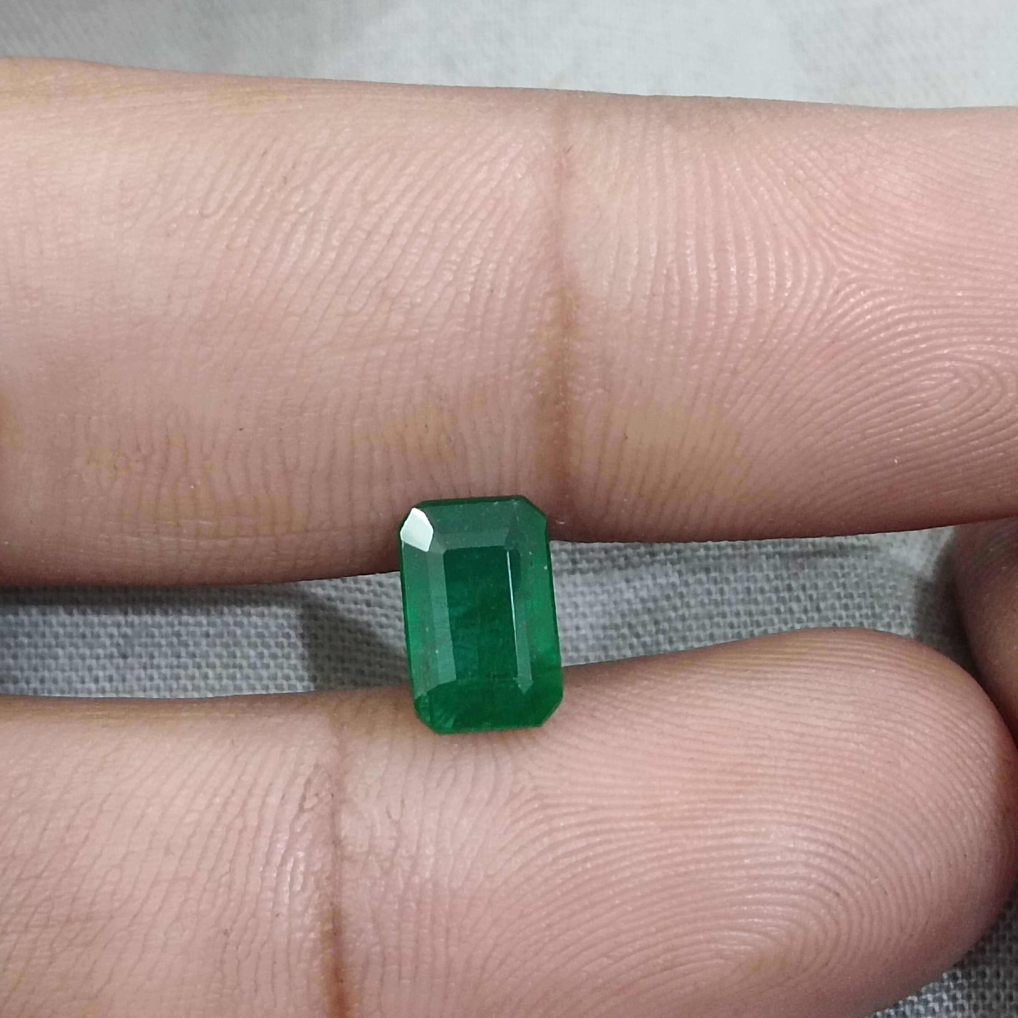 1.69ct certified deep green octagon cut emerald gemstone 