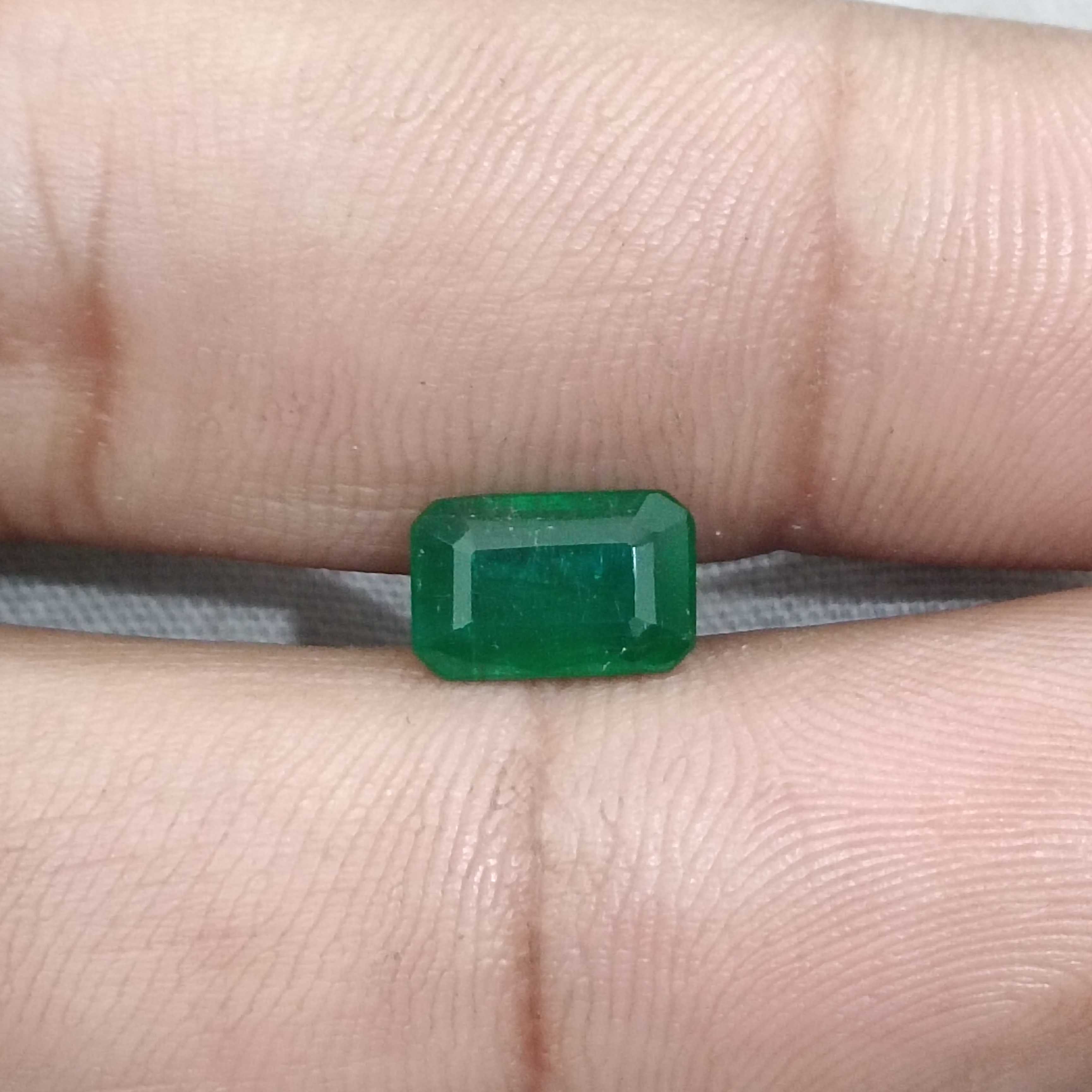 1.69ct certified deep green octagon cut emerald gemstone 