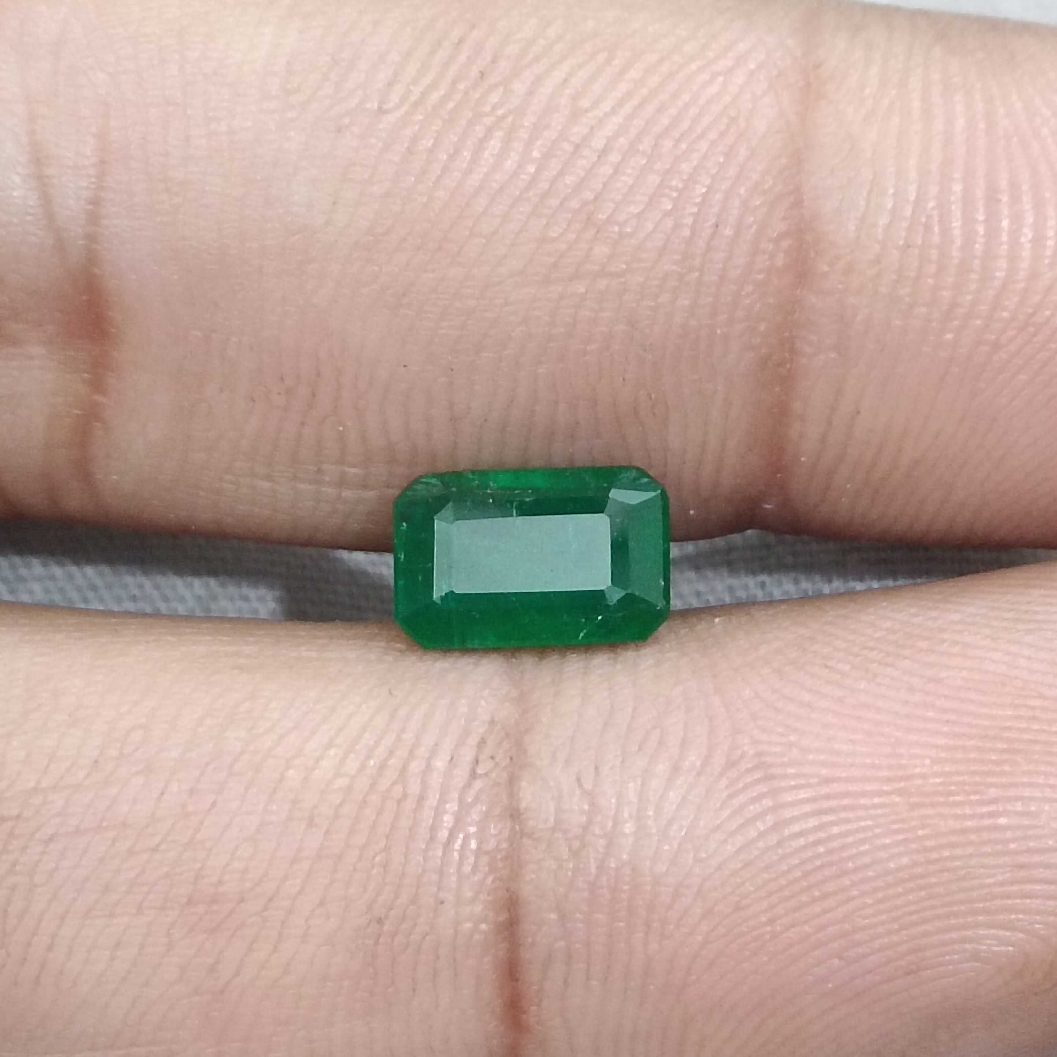 1.69ct certified deep green octagon cut emerald gemstone 