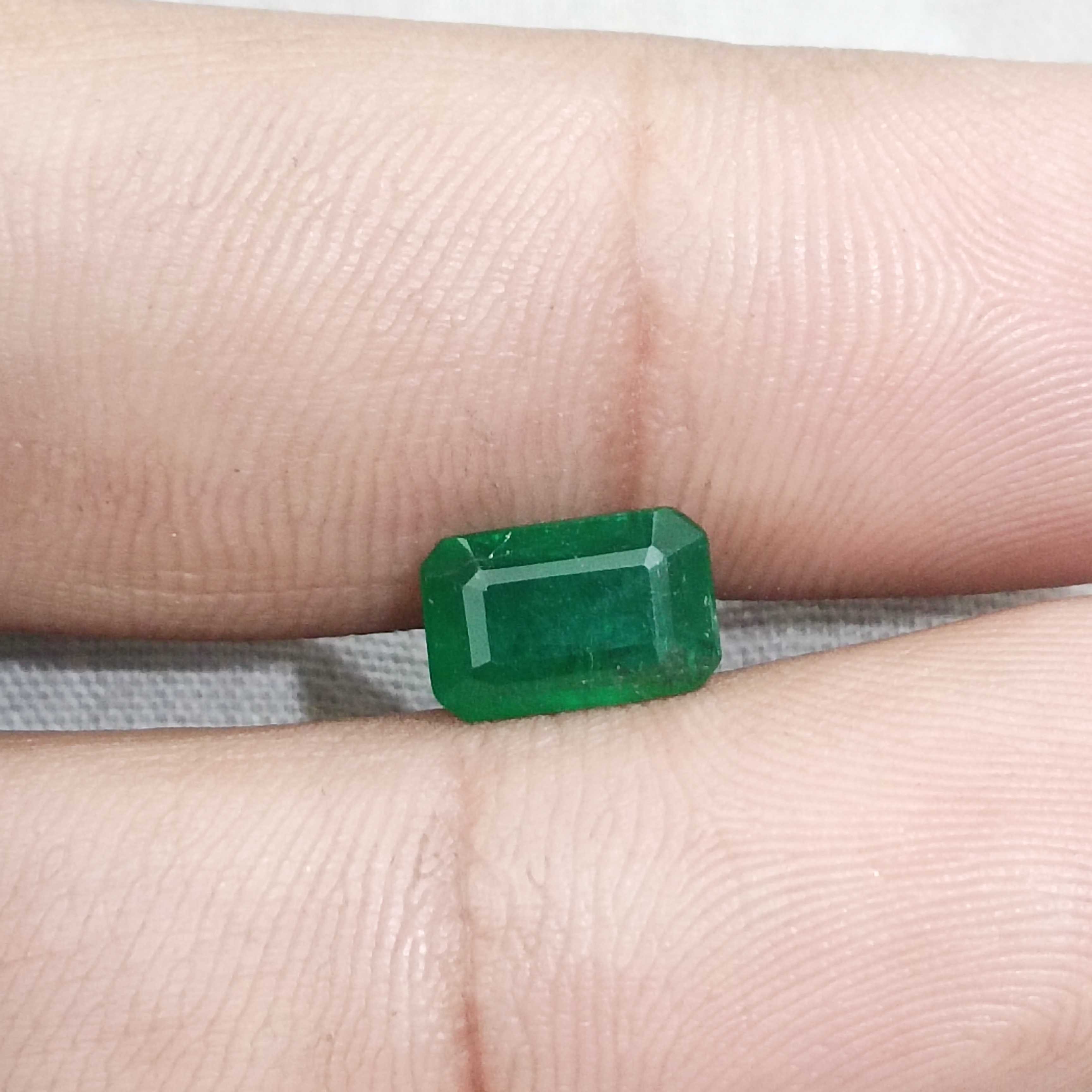 1.69ct certified deep green octagon cut emerald gemstone 