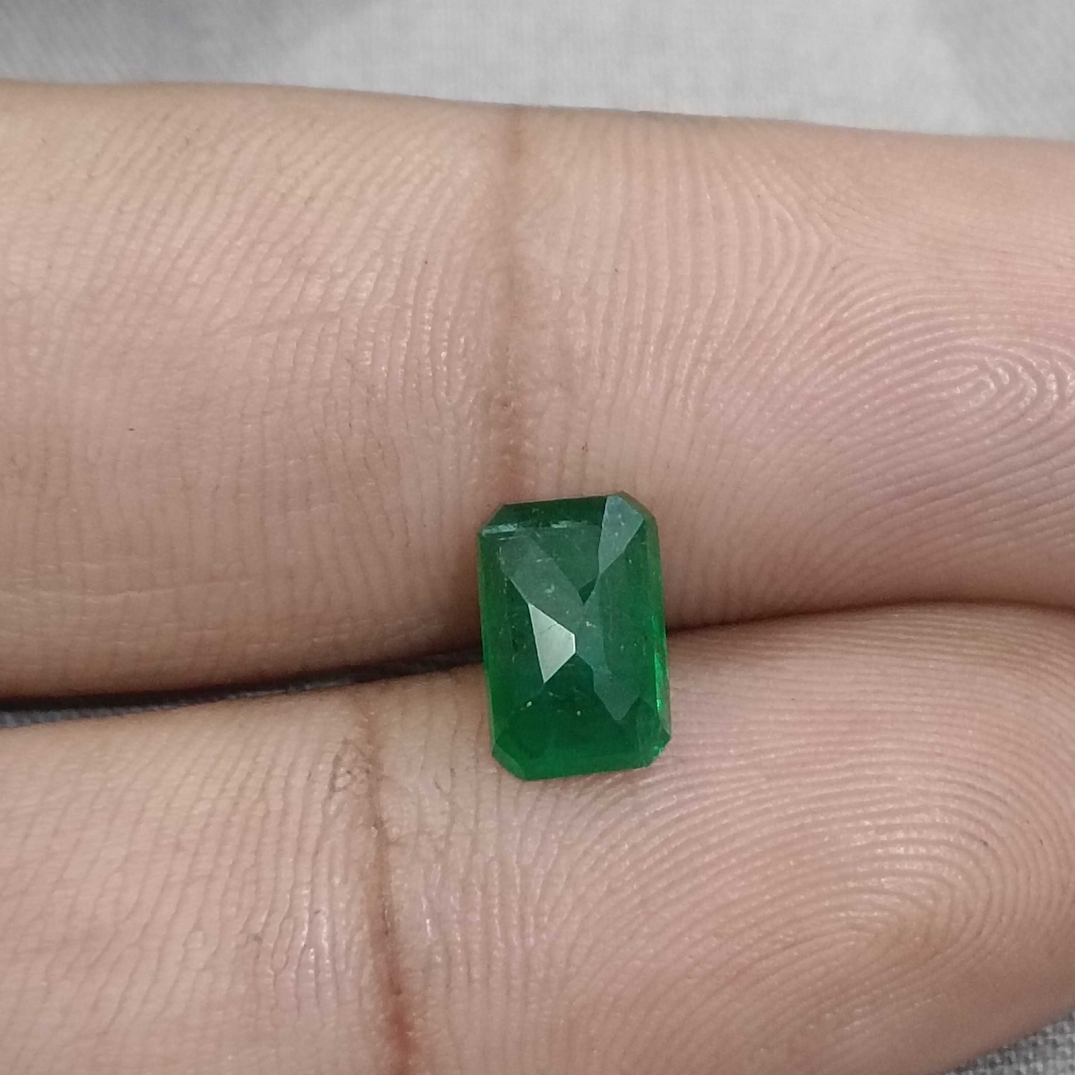 1.69ct certified deep green octagon cut emerald gemstone 