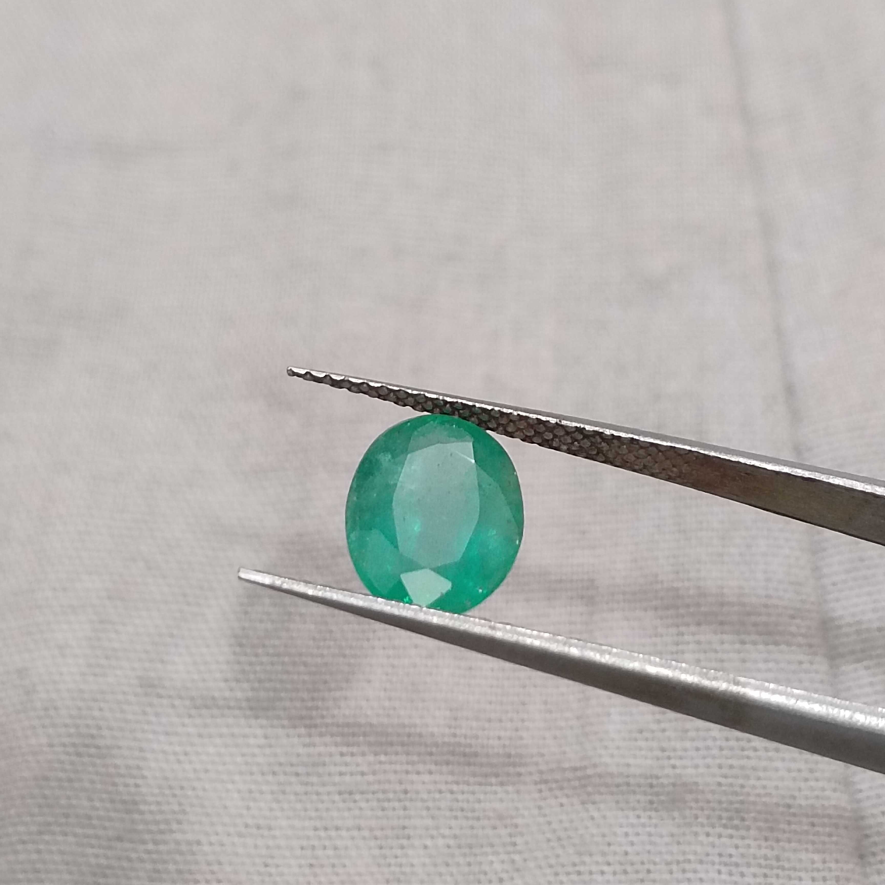 2.04ct light medium green oval cut emerald gemstone 