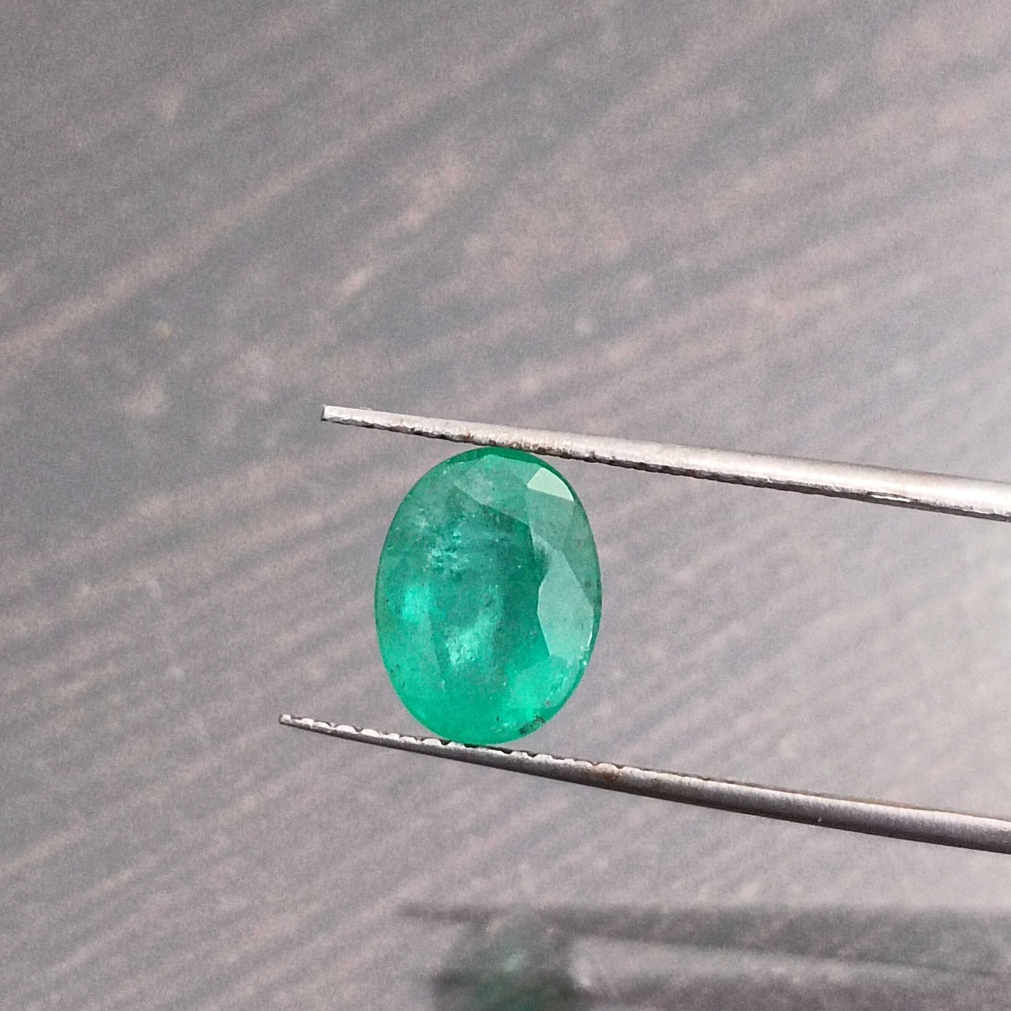 2.04ct light medium green oval cut emerald gemstone 