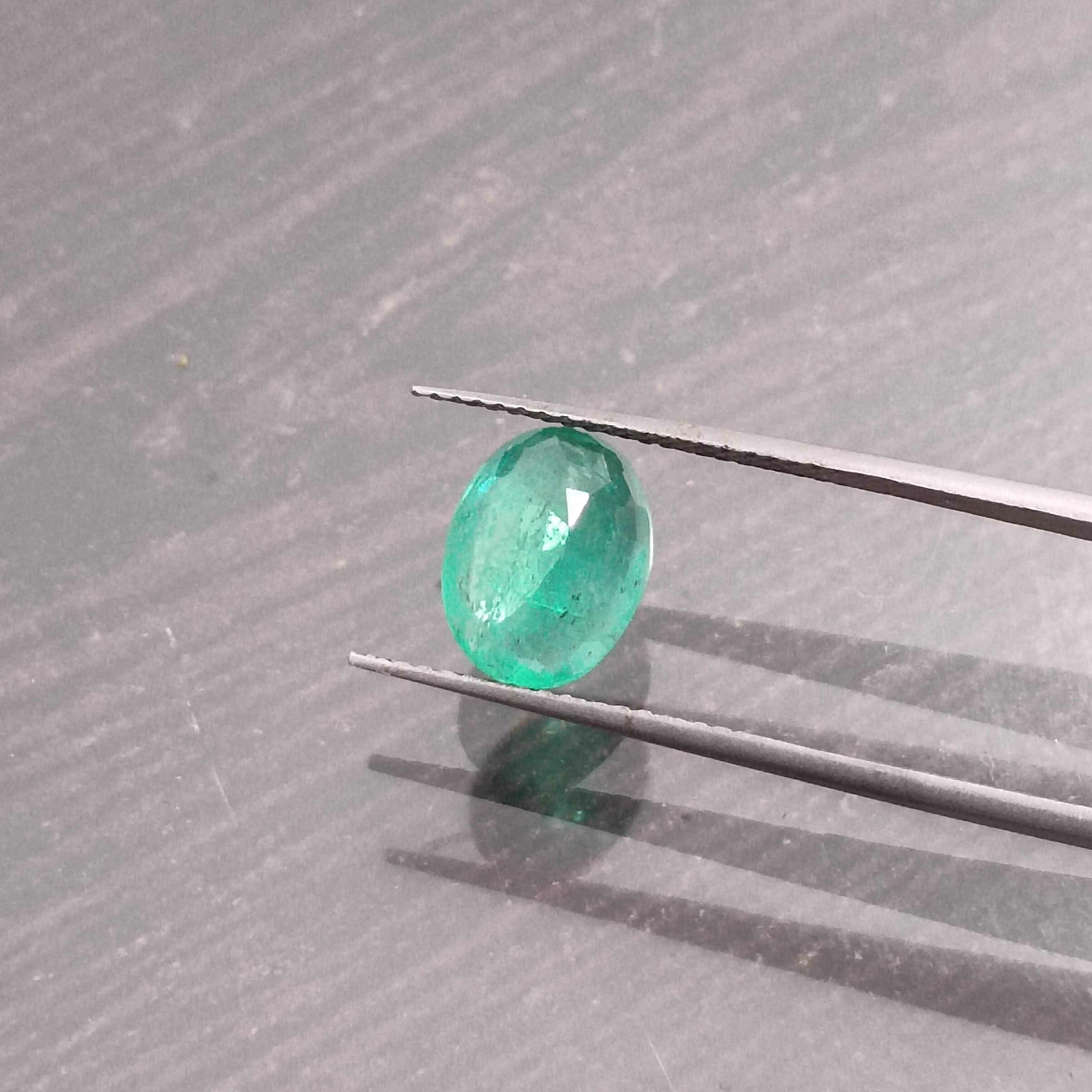 2.04ct light medium green oval cut emerald gemstone 