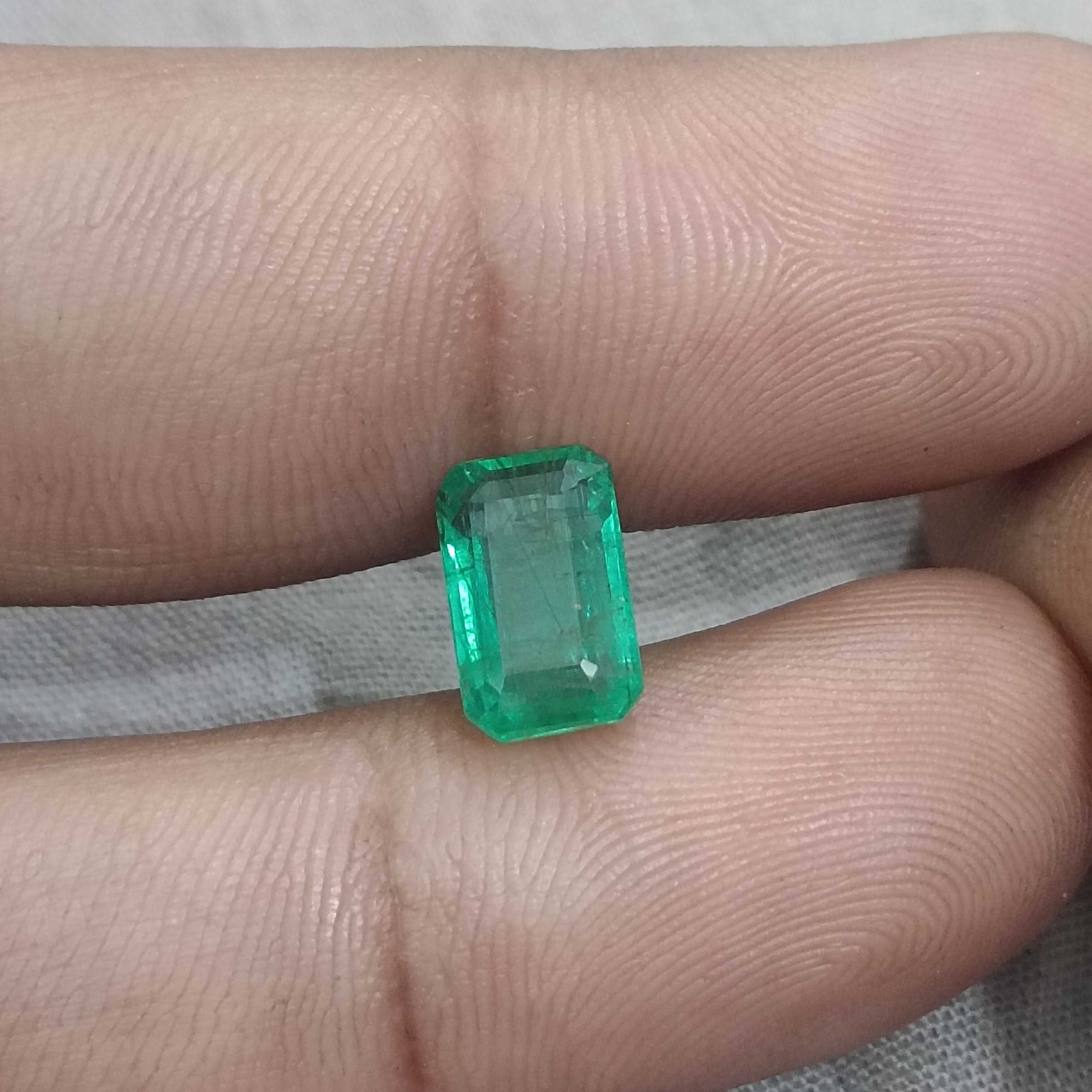 2.74ct certified intense medium green octagon cut emerald gemstone 