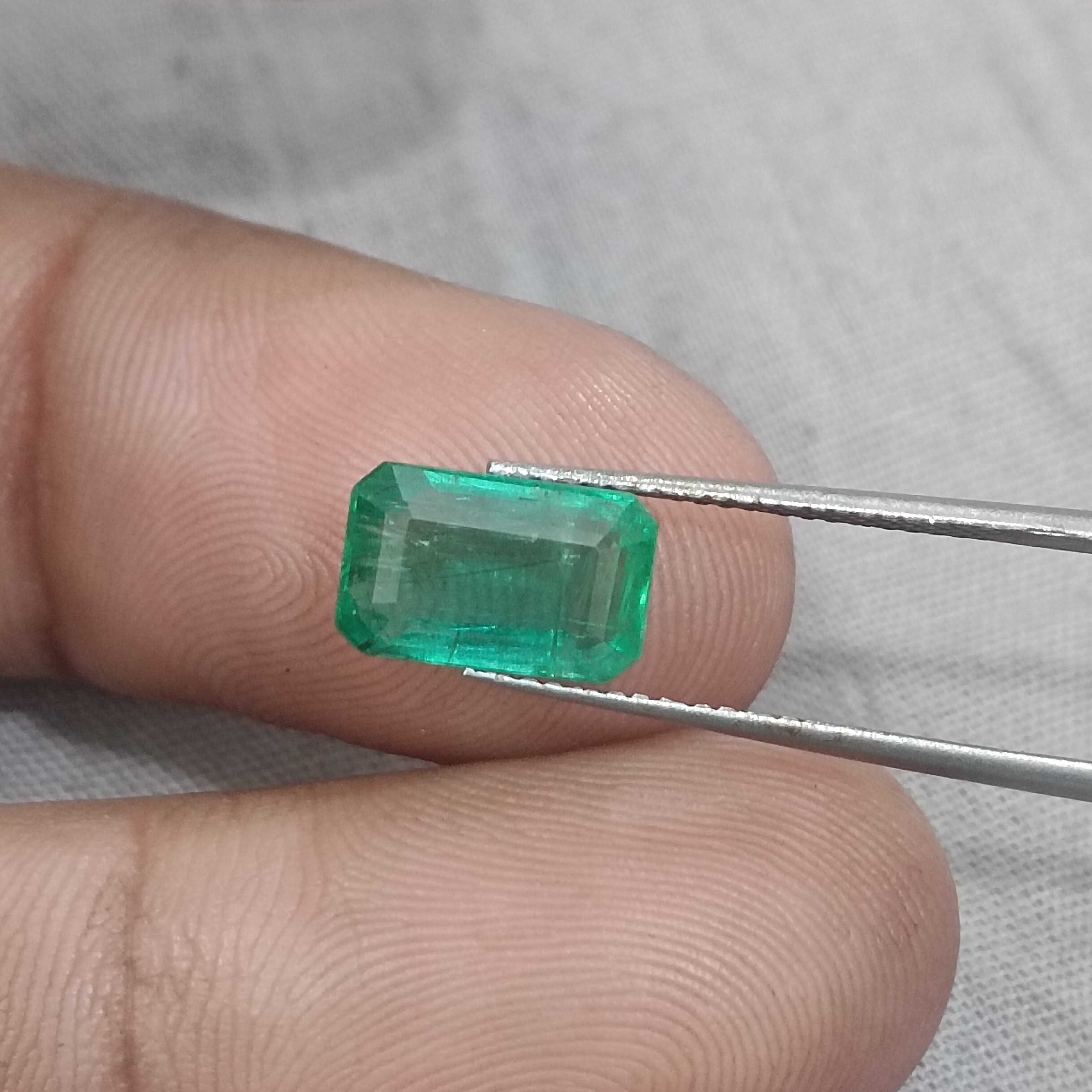 2.74ct certified intense medium green octagon cut emerald gemstone 