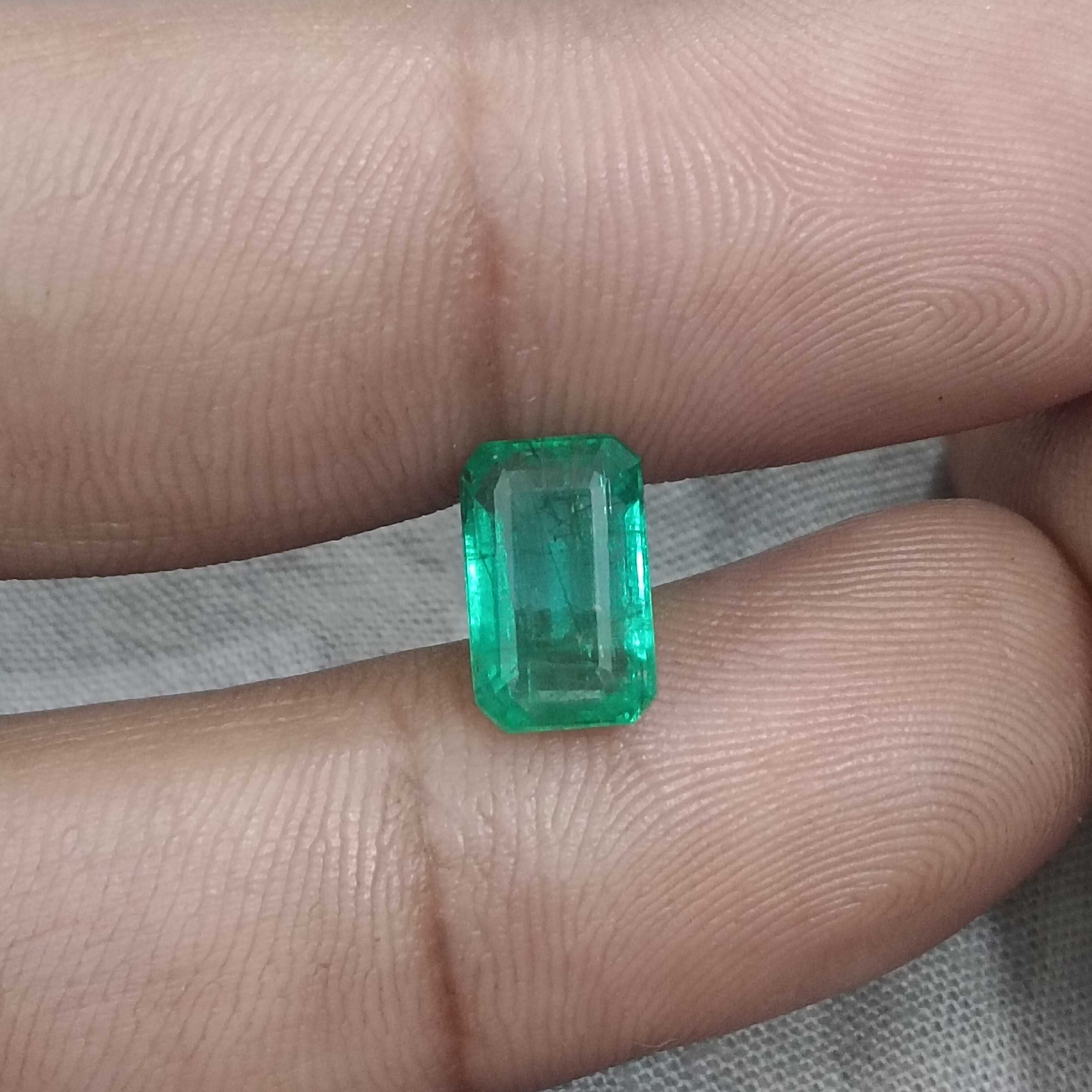 2.74ct certified intense medium green octagon cut emerald gemstone 